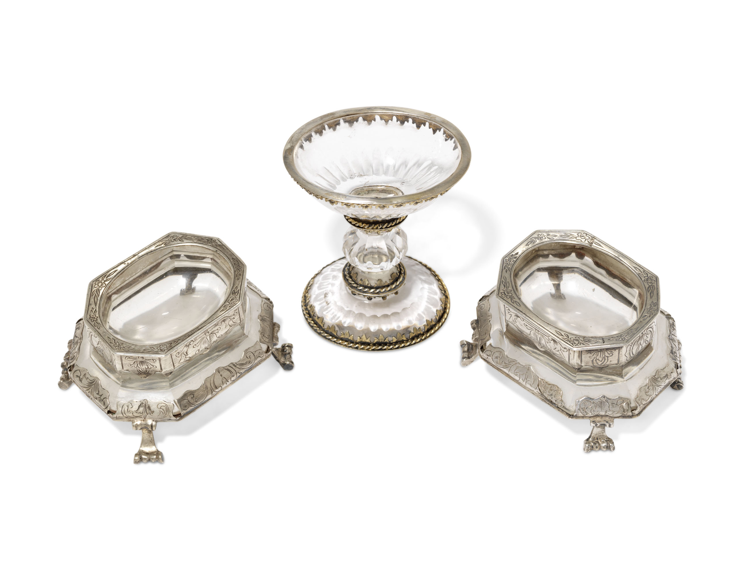 THREE CONTINENTAL SILVERMOUNTED ROCK CRYSTAL SALT CELLARS, THE SINGLE