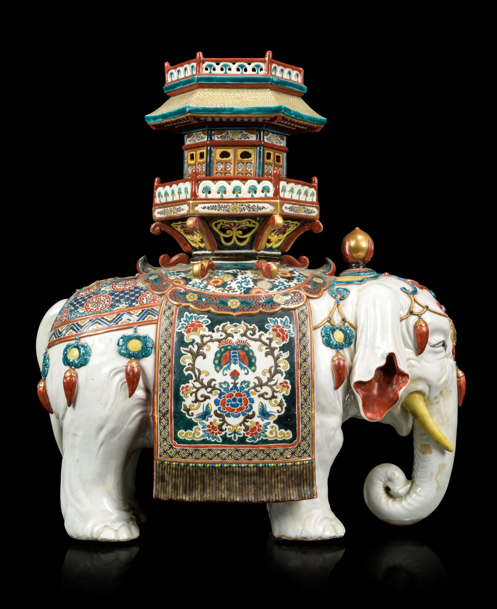 A JAPANESE PORCELAIN MODEL OF AN ELEPHANT, MEIJI PERIOD (1868-1912