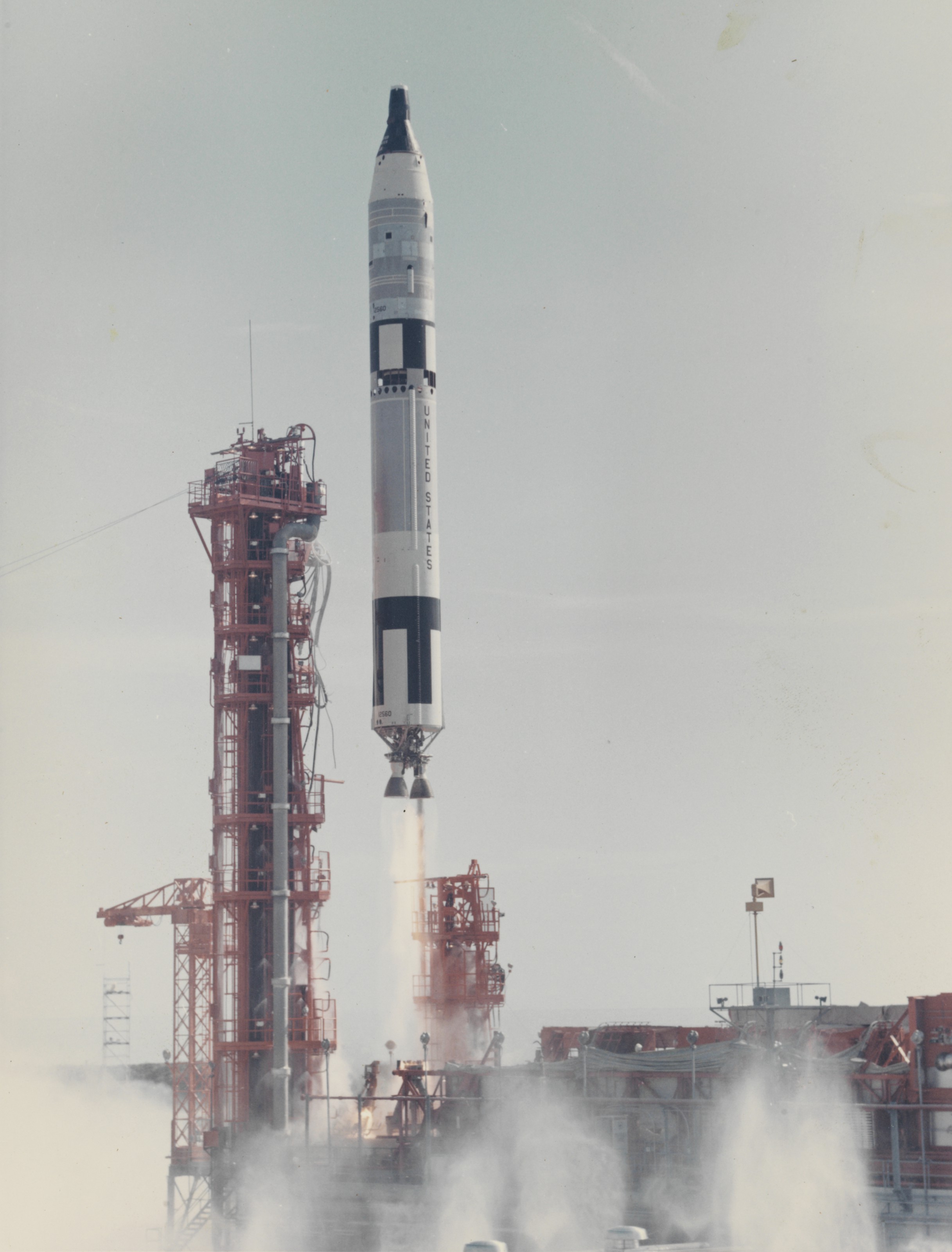 Launch of the Titan Rocket: 2 photographs of Gemini V as it lifts