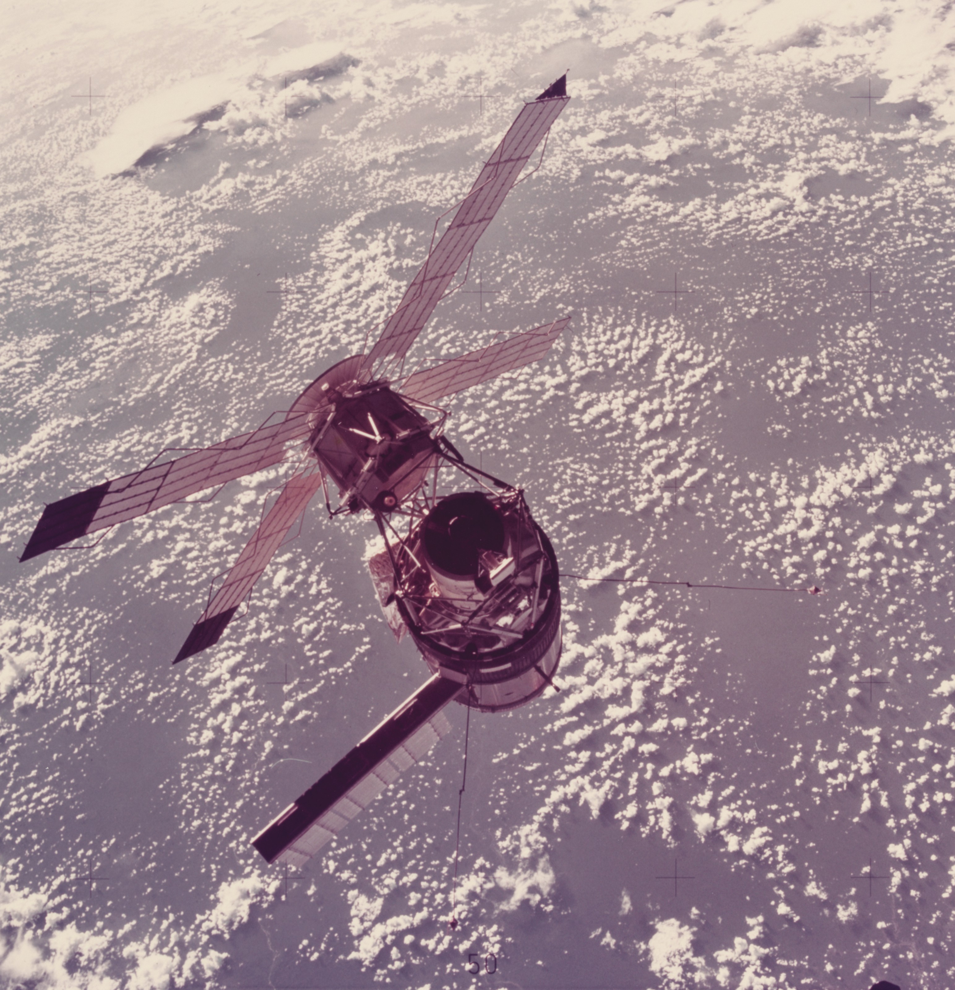 The first American space station Skylab 3 above the Earth; Astronaut