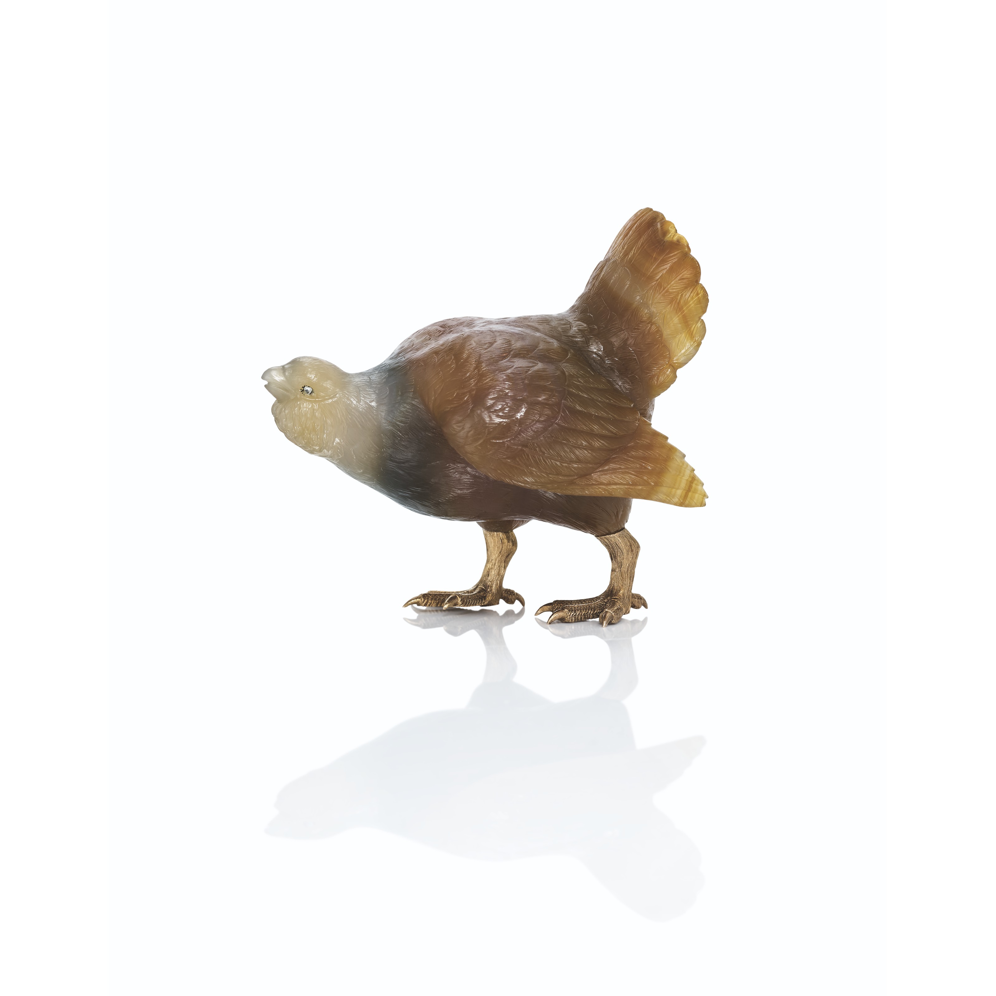 A jewelled gold-mounted agate model of a capercaillie, by Faberg&eacute;, St Petersburg, circa 1900. 2&frac34; in (6.9 cm) high. Sold for &pound;150,000 on 29 November 2021 at Christie&rsquo;s in London