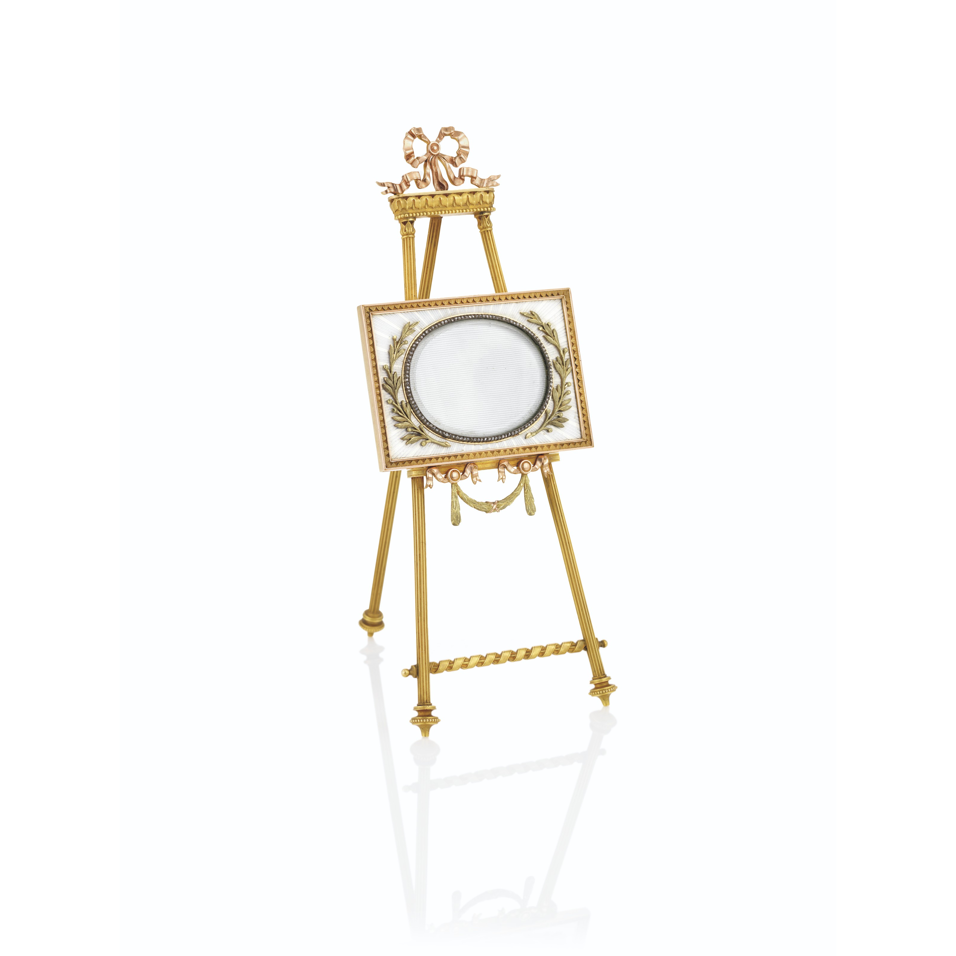 A jewelled and guilloch&eacute; enamel three-colour gold photograph frame, by Faberg&eacute;. Moscow, 1899-1908. 6 in (15.2 cm) high. Sold for &pound;137,500 on 29 November 2021 at Christie&rsquo;s in London