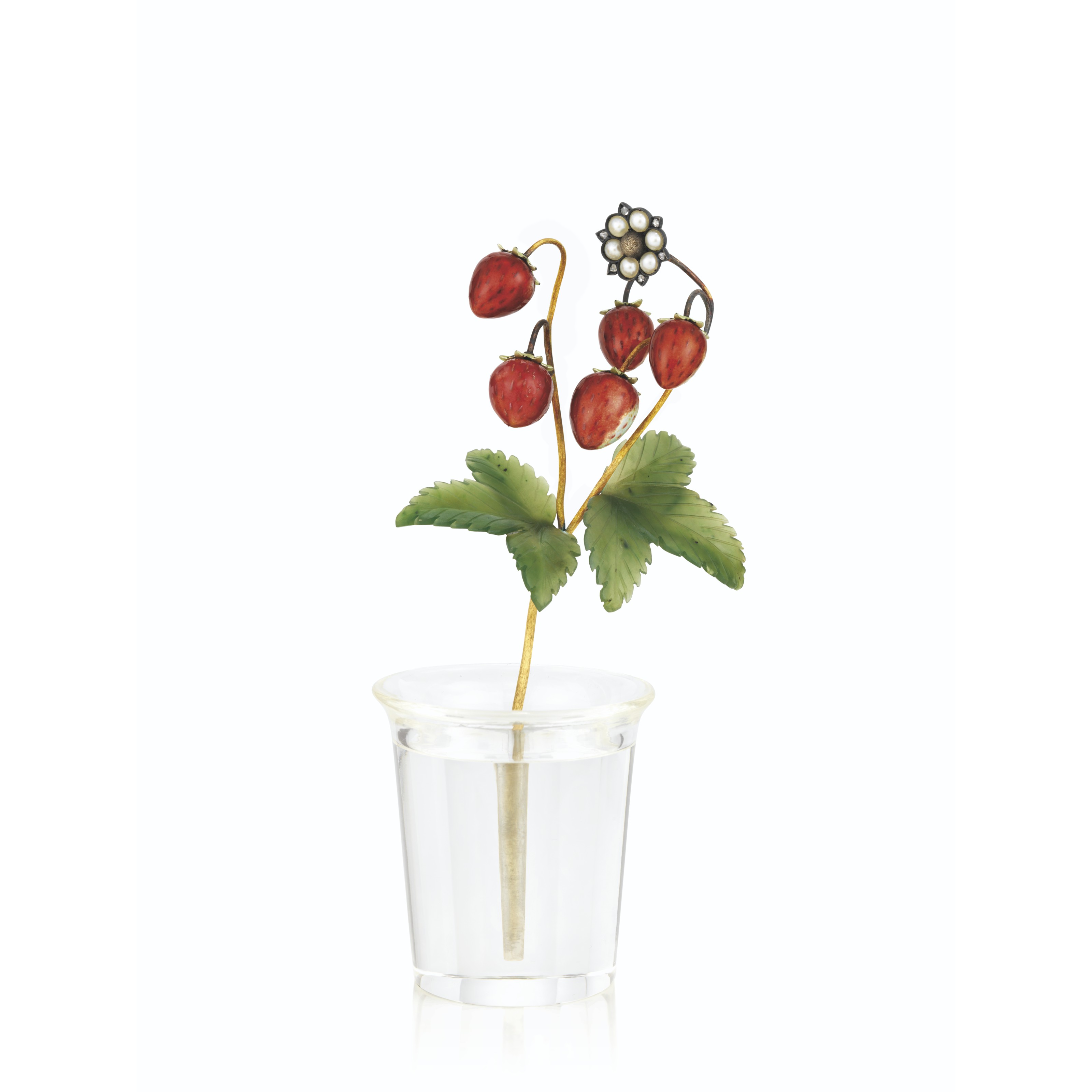 A rare gold-mounted enamel, nephrite and rock crystal study of wild strawberries, by Faberg&eacute;, St Petersburg, circa 1900. 4 in (10.2 cm) high. Sold for &pound;325,000 on 29 November 2021 at Christie&rsquo;s in London