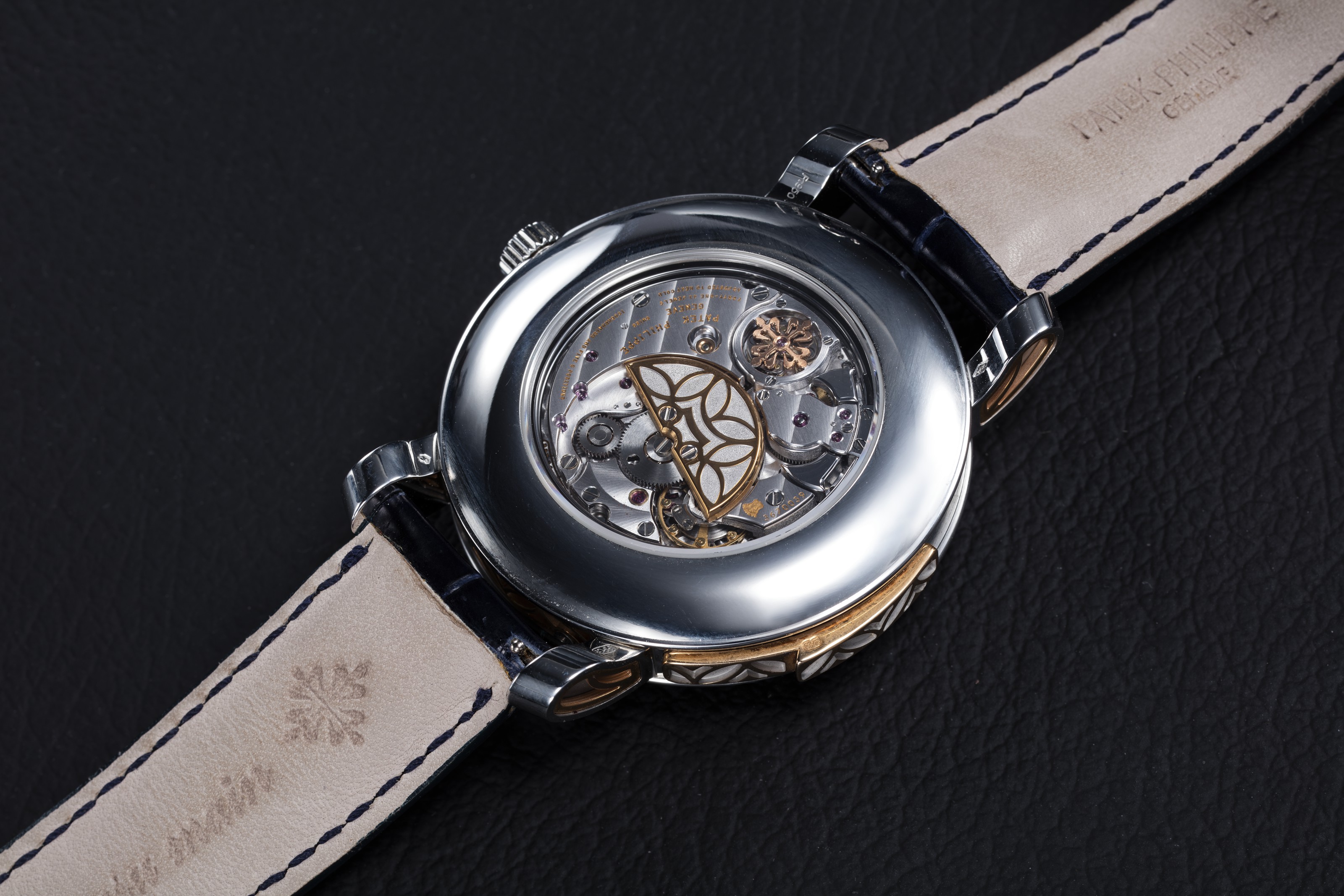 PATEK PHILIPPE REF. 5104P A PLATINUM AND GOLD MINUTE REPEATER PERPETUAL CALENDAR CASE NUMBER 4 477 093 MOVEMENT NUMBER 3 670 039 Christie s