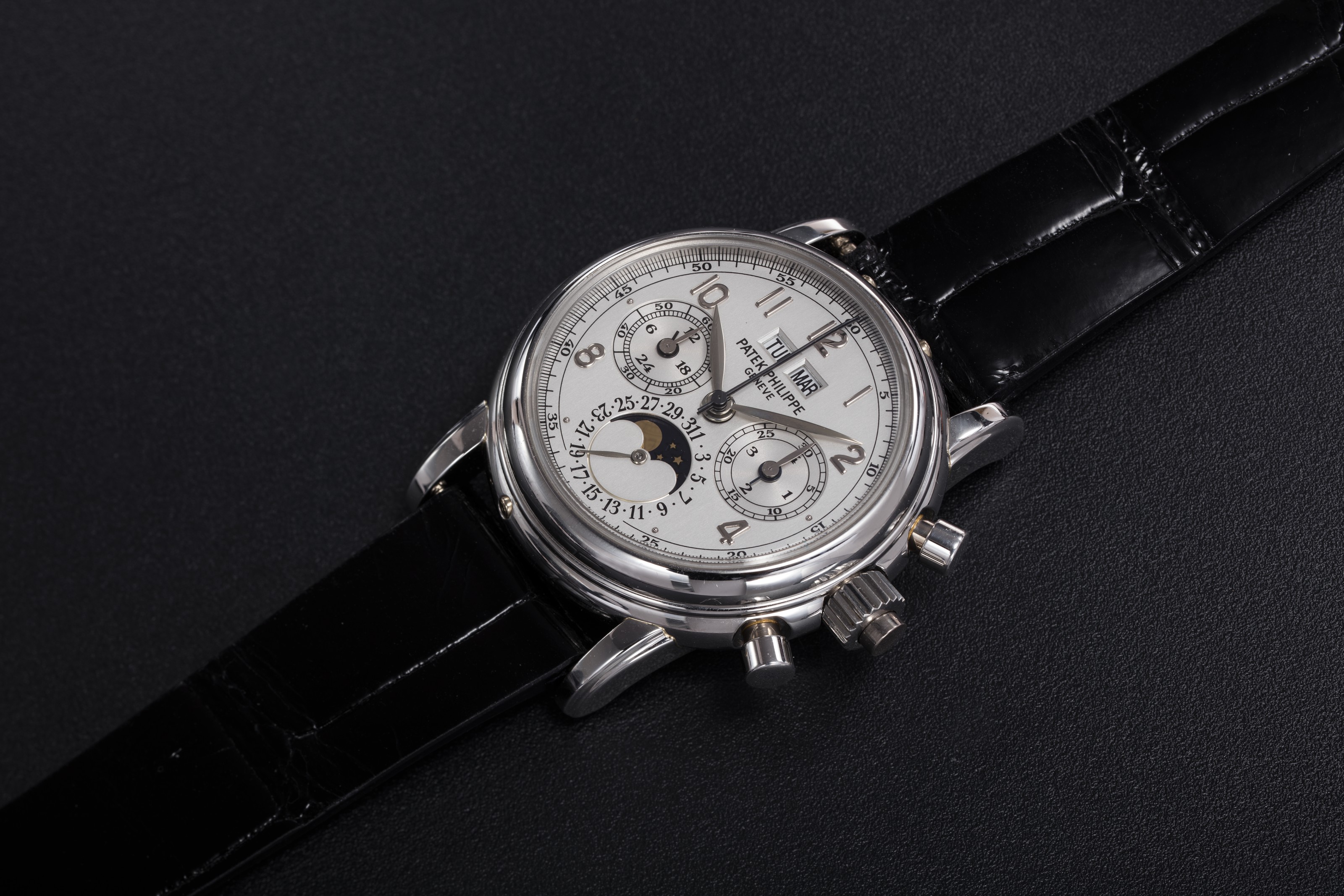 PATEK PHILIPPE, REF. 5004R, A RARE PERPETUAL CALENDAR SPLIT-SECONDS  CHRONOGRAPH WITH RUBY HOUR-MARKERS, CASE NUMBER: 4'146'775, MOVEMENT  NUMBER: 879'861 | Christie's
