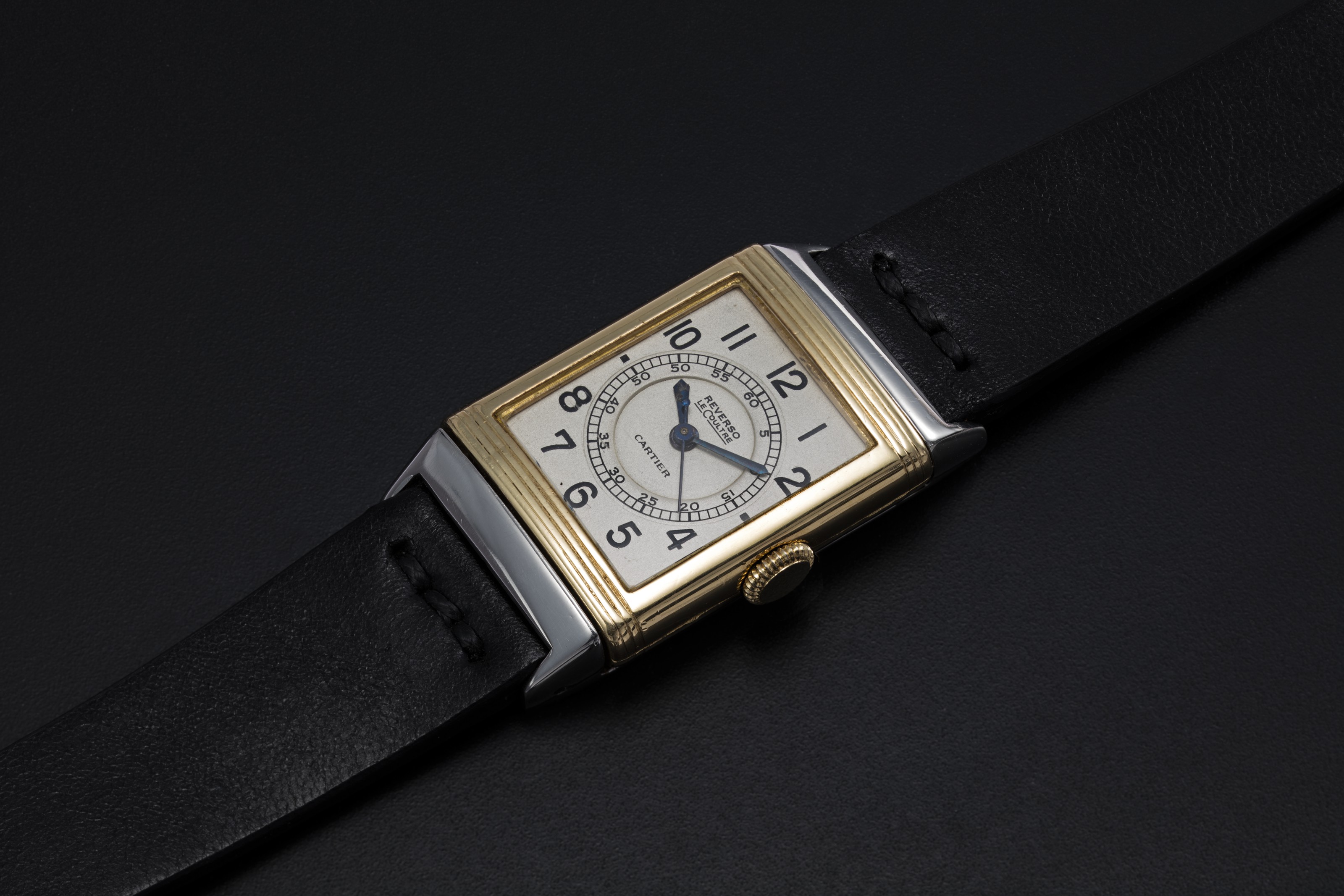 LECOULTRE, A TWO TONE REVERSO RETAILED BY CARTIER, CASE NUMBER: STAMPED ...