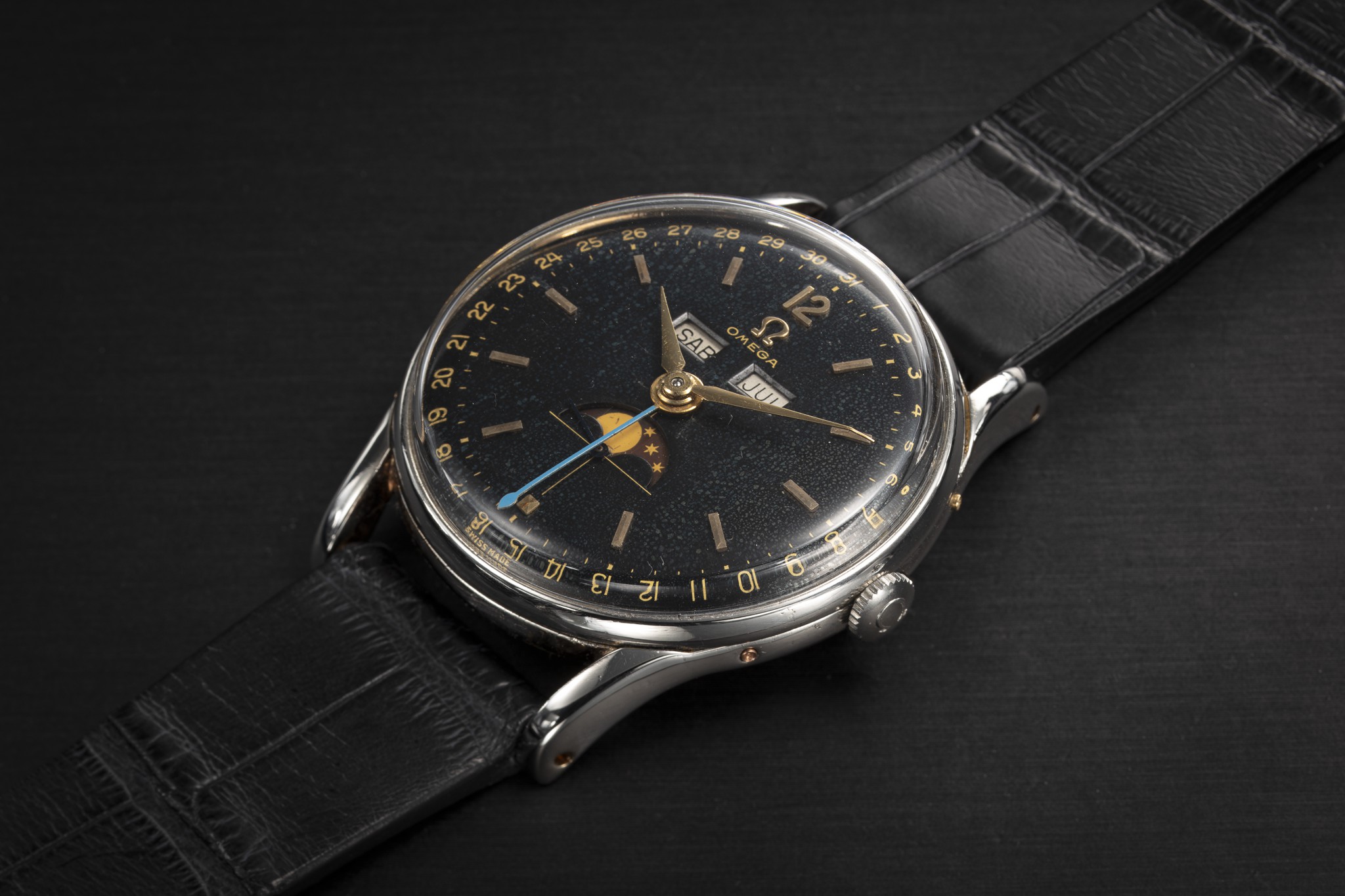 Omega cosmic store moonphase black dial