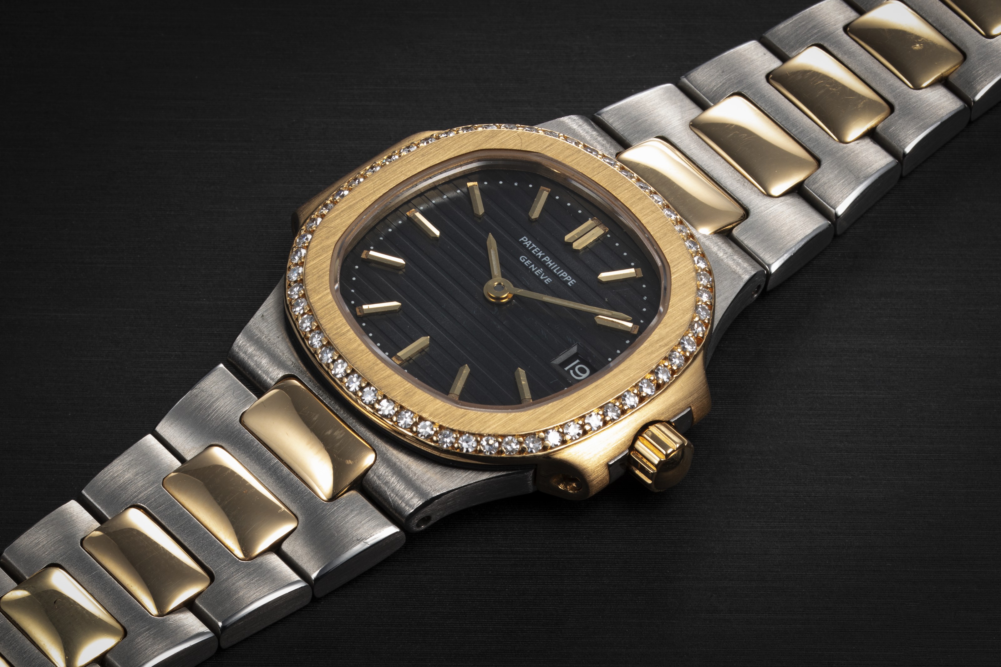 PATEK PHILIPPE NAUTILUS REF 4700 2 A LADIES STEEL GOLD AND DIAMOND WRISTWATCH CASE NUMBER 558 167 Christie s