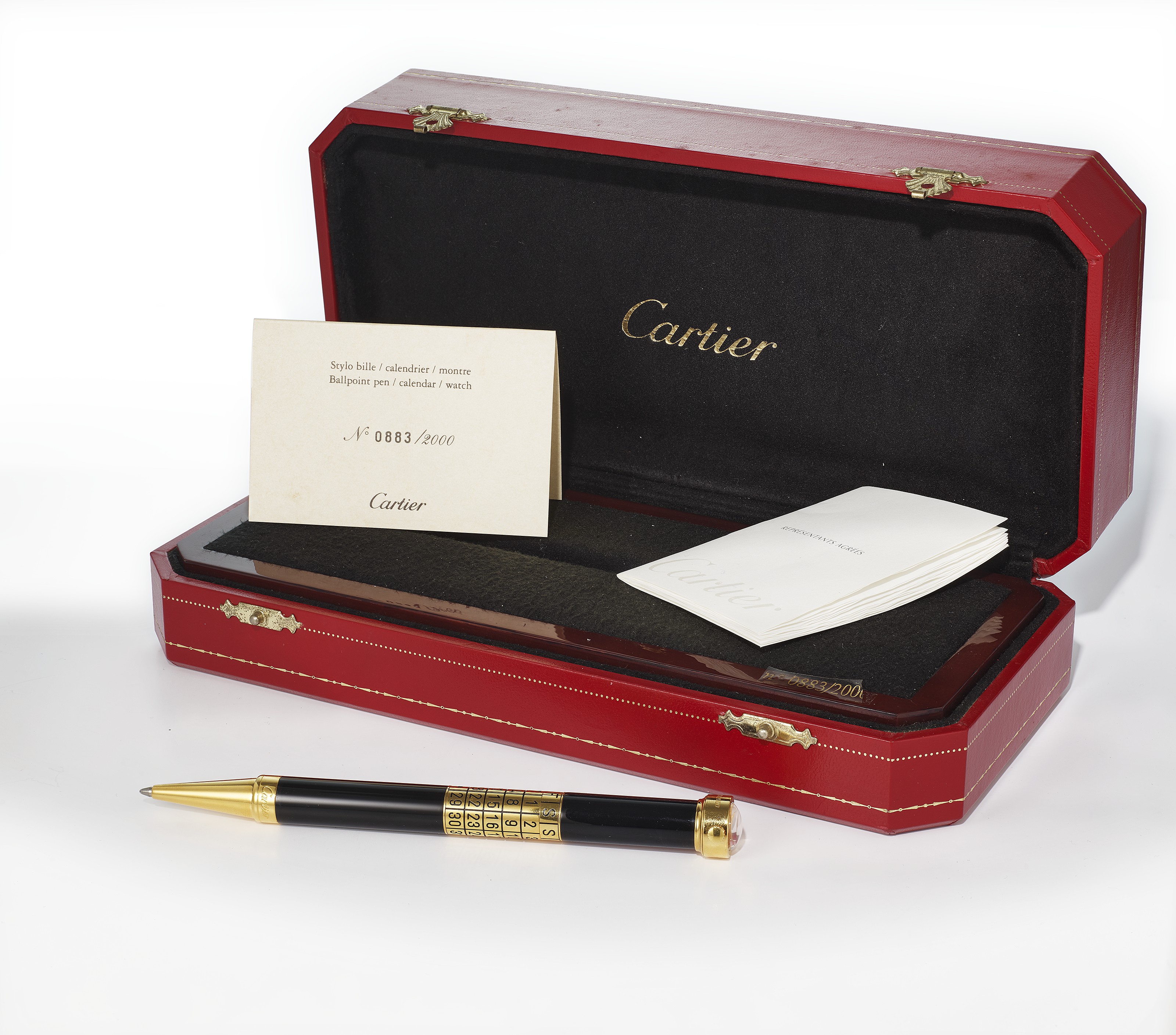 CARTIER GILT AND BLACK LACQUER LIMITED EDITION BALLPOINT PEN WITH WATCH AND CALENDAR NO. 0883 2000 Christie s
