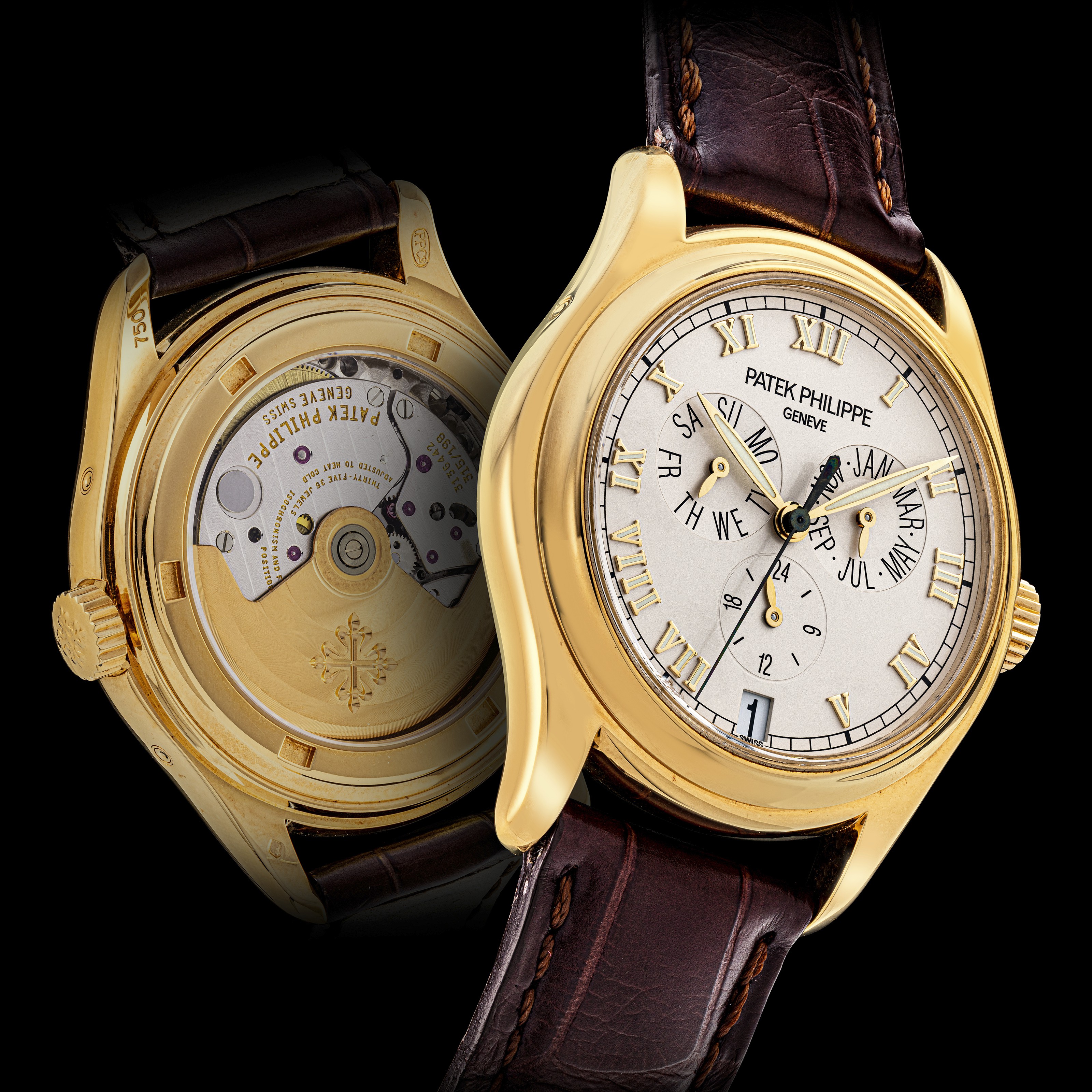 PATEK PHILIPPE GOLD WITH ANNUAL CALENDAR AND 24 HOUR INDICATION