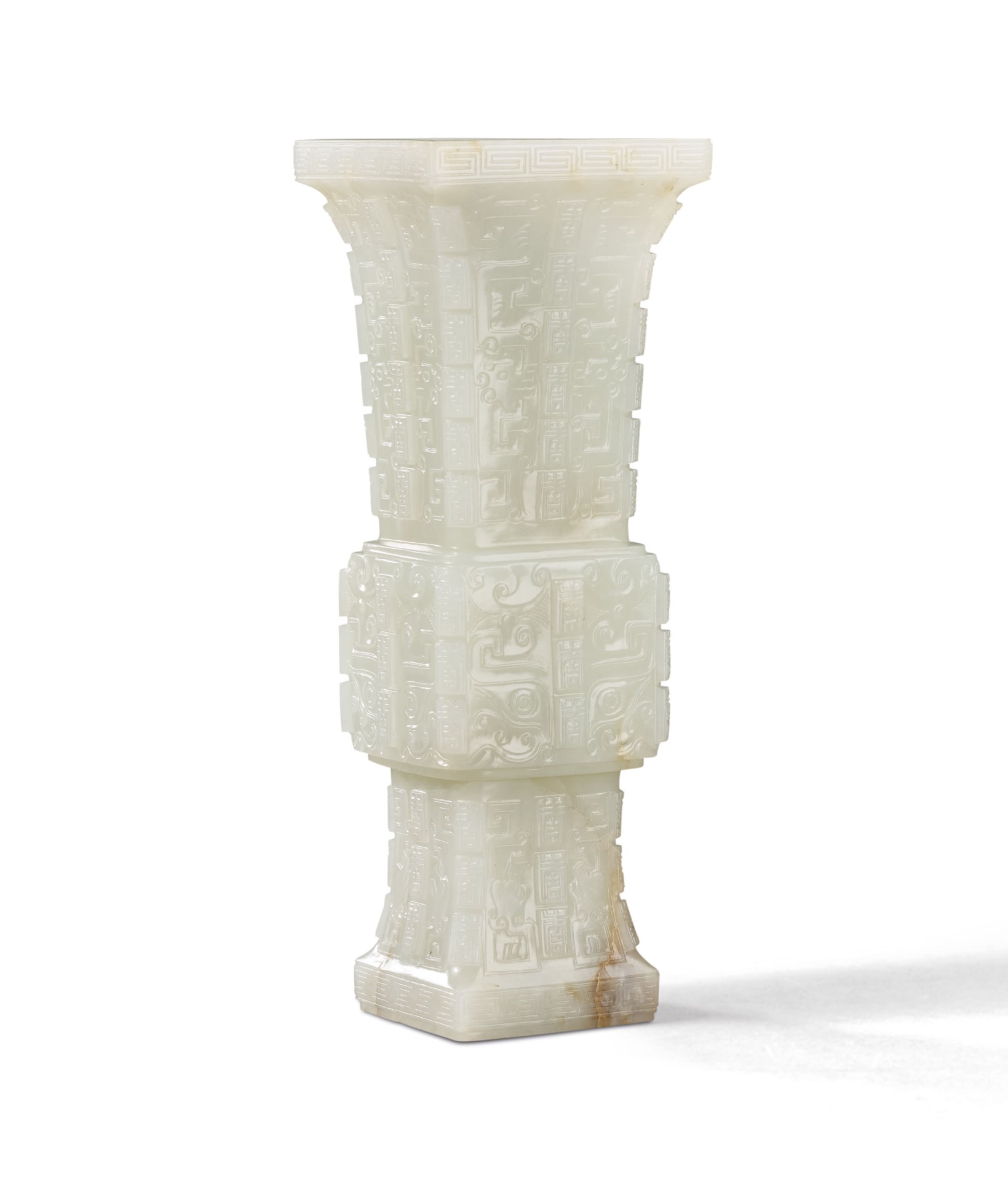AN ARCHAISTIC WHITE JADE VASE, GU, QING DYNASTY, 19TH CENTURY Christie's