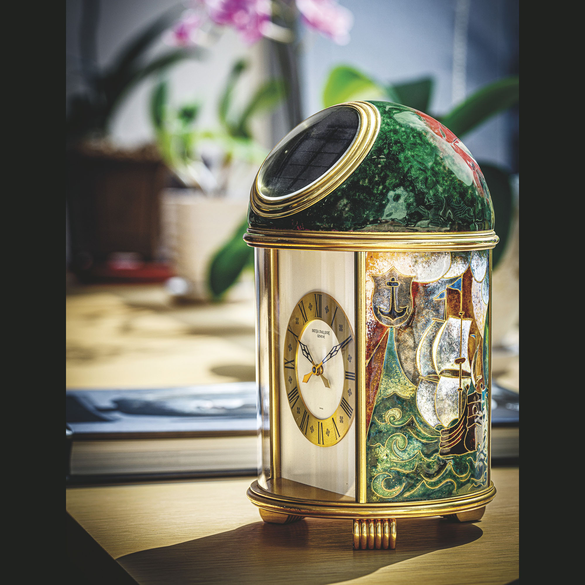 PATEK PHILIPPE. A UNIQUE GILT BRASS SOLAR POWERED DOME CLOCK WITH CLOISONNE ENAMEL REF. 1123M TRISTAN DE LEONOIS MANUFACTURED IN 1976 Christie s