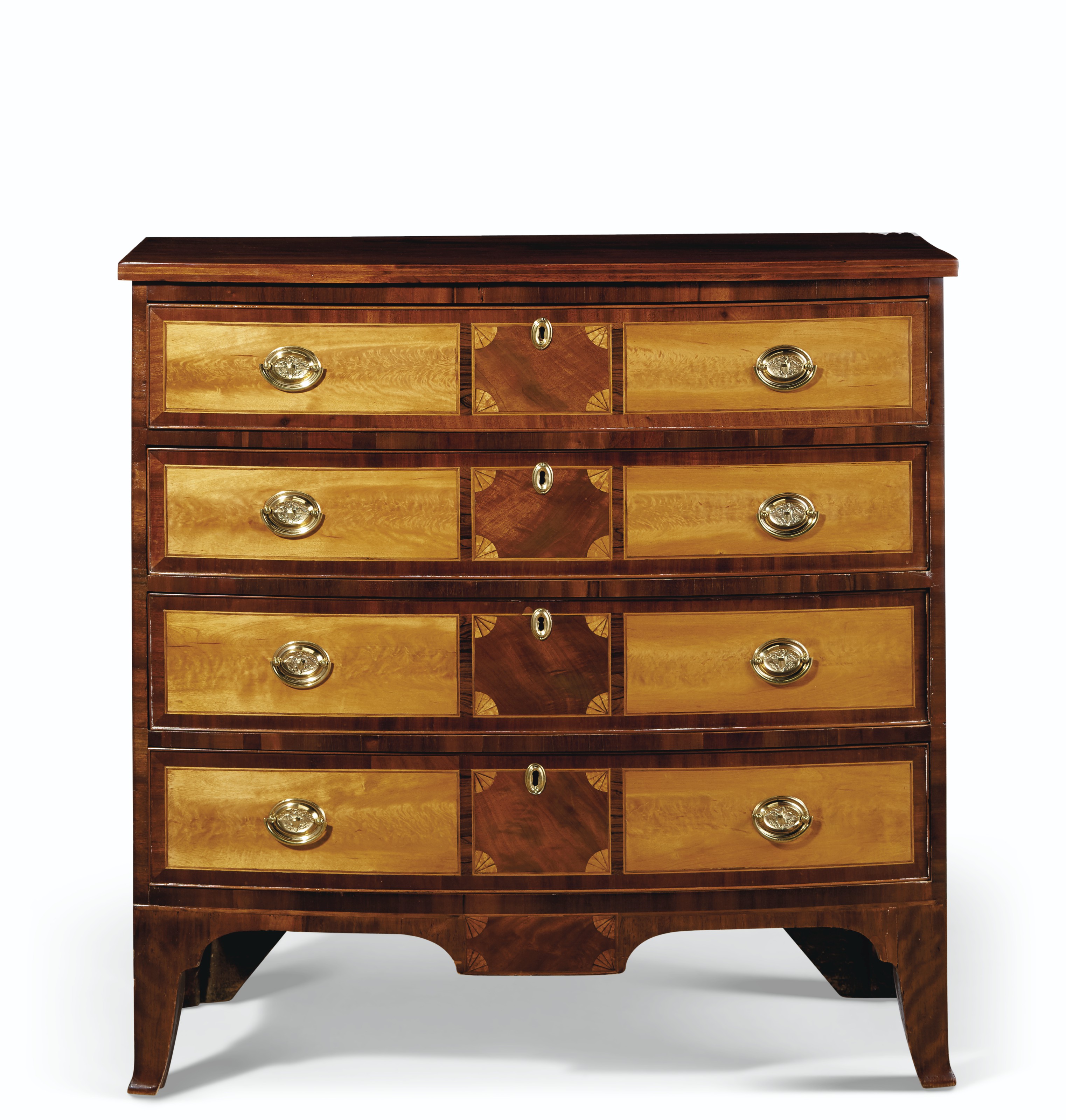 A FEDERAL MAHOGANY AND FLAMEBIRCH VENEERED BOWFRONT CHESTOFDRAWERS