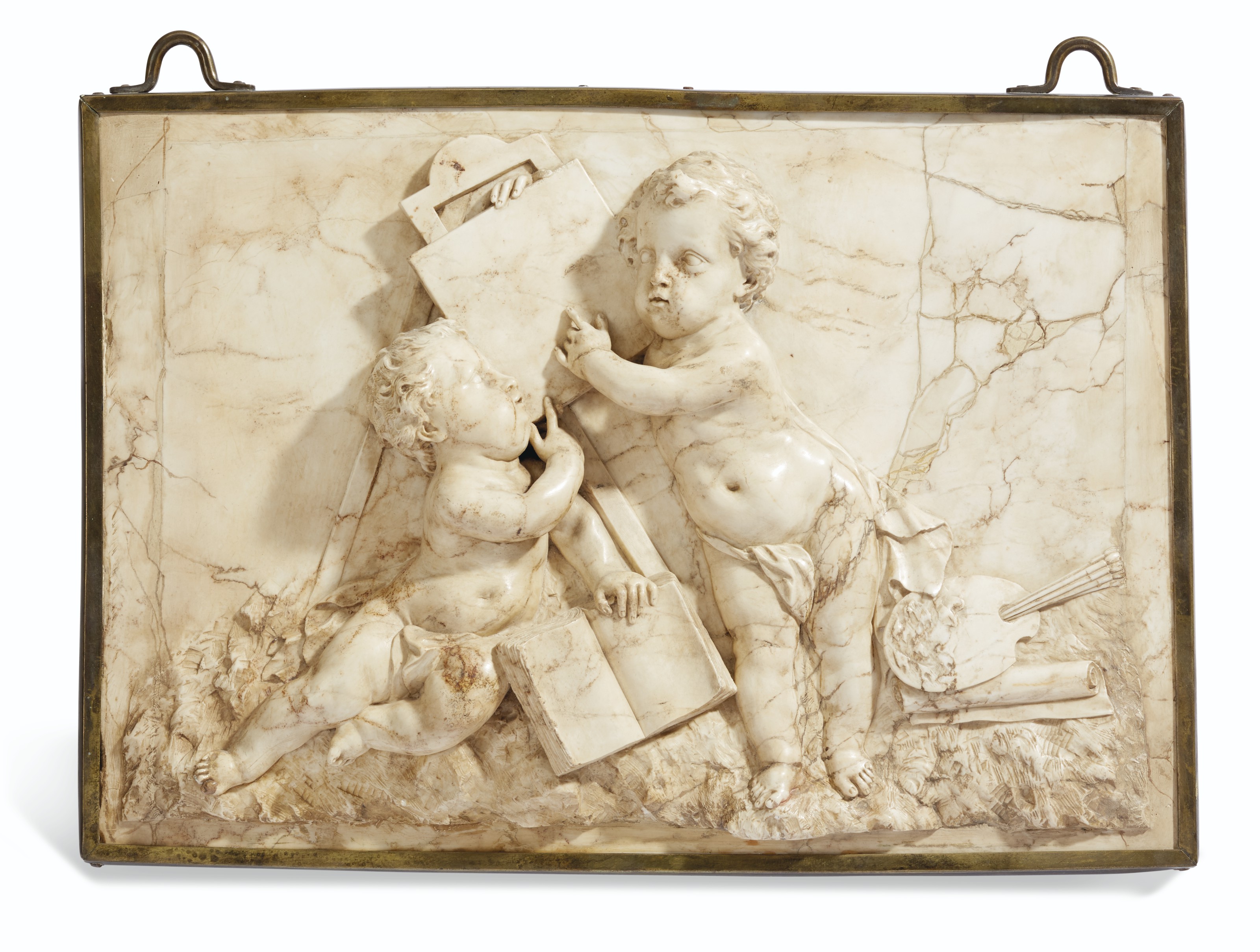 A PAIR OF STONE RELIEFS