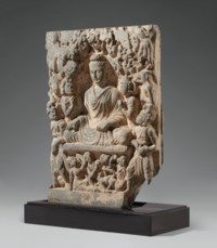 A LARGE GRAY SCHIST RELIEF DEPICTING BUDDHA SHAKYAMUNI, ANCIENT REGION ...