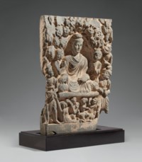 A LARGE GRAY SCHIST RELIEF DEPICTING BUDDHA SHAKYAMUNI, ANCIENT REGION ...