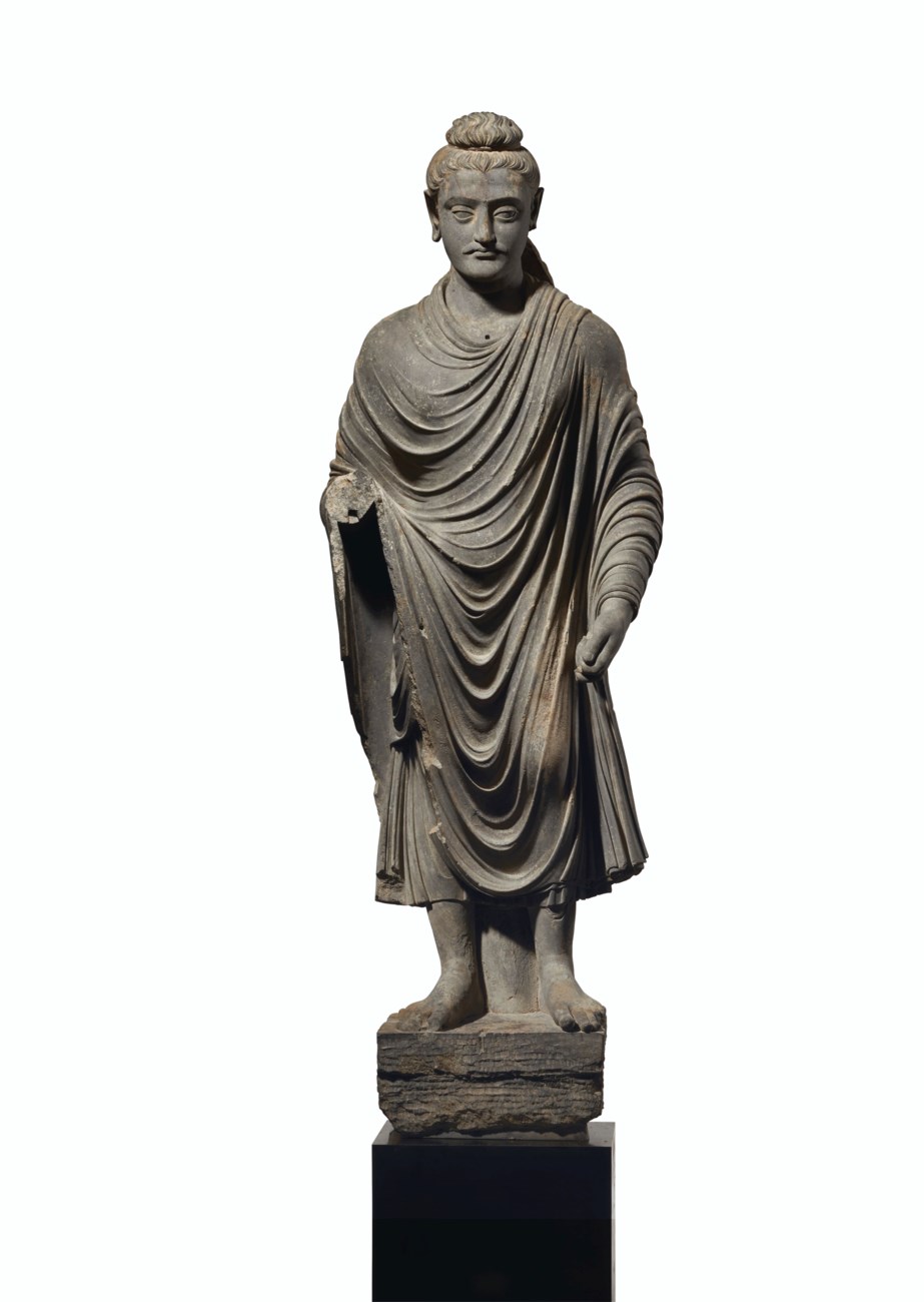 A MAGNIFICENT AND MONUMENTAL GRAY SCHIST FIGURE OF BUDDHA SHAKYAMUNI ...