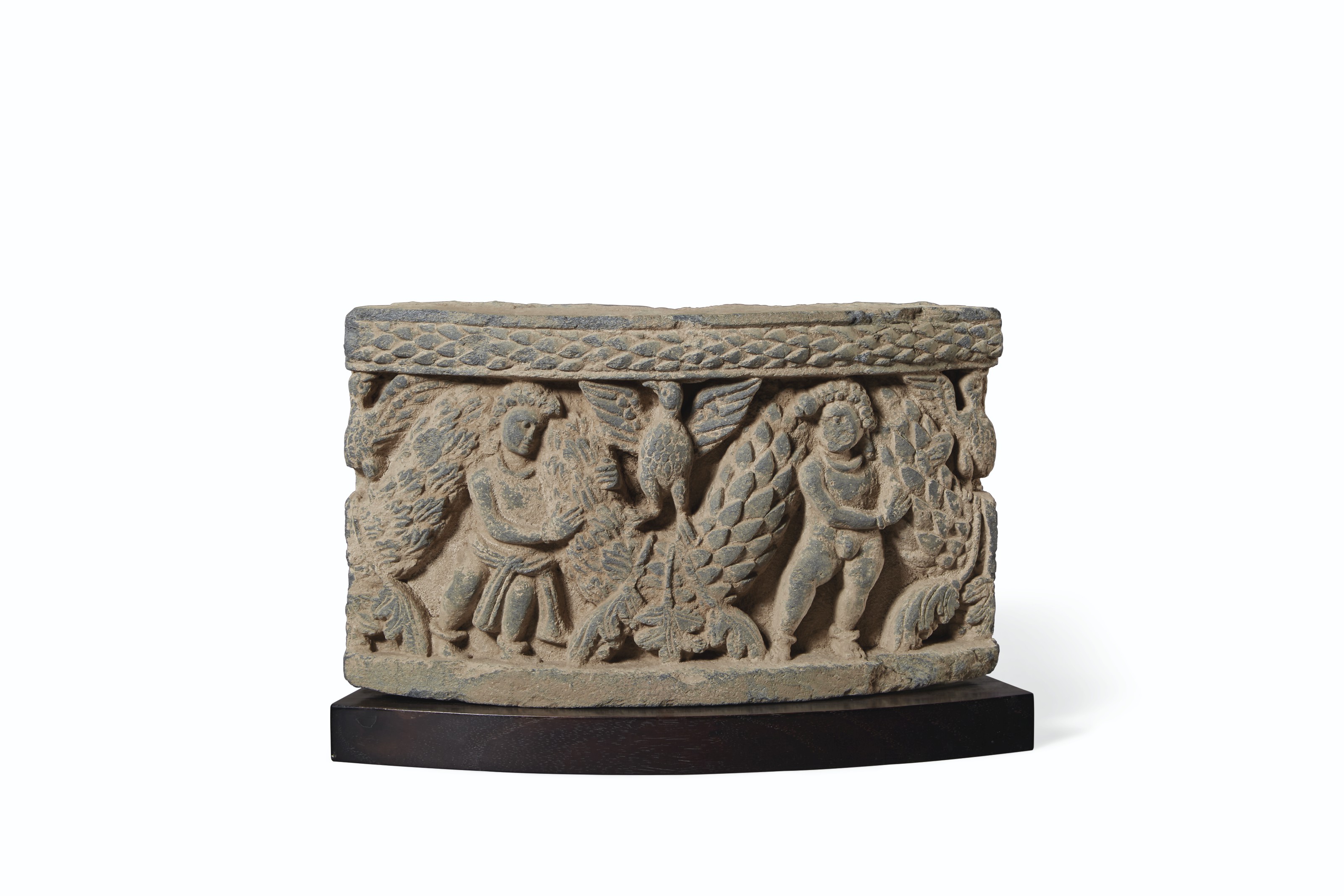 A GRAY SCHIST RELIEF OF BUDDHA FLANKED BY BODHISATTVAS, ANCIENT REGION ...