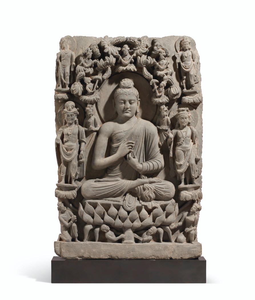 A RARE GRAY SCHIST RELIEF TRIAD OF BUDDHA SHAKYAMUNI FLANKED BY ...