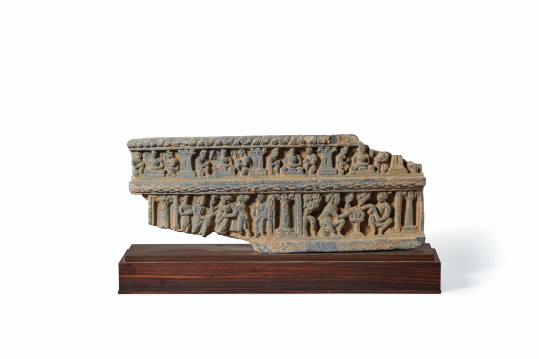 A GRAY SCHIST RELIEF PANEL WITH A SCENE OF THE BIRTH OF THE BUDDHA ...