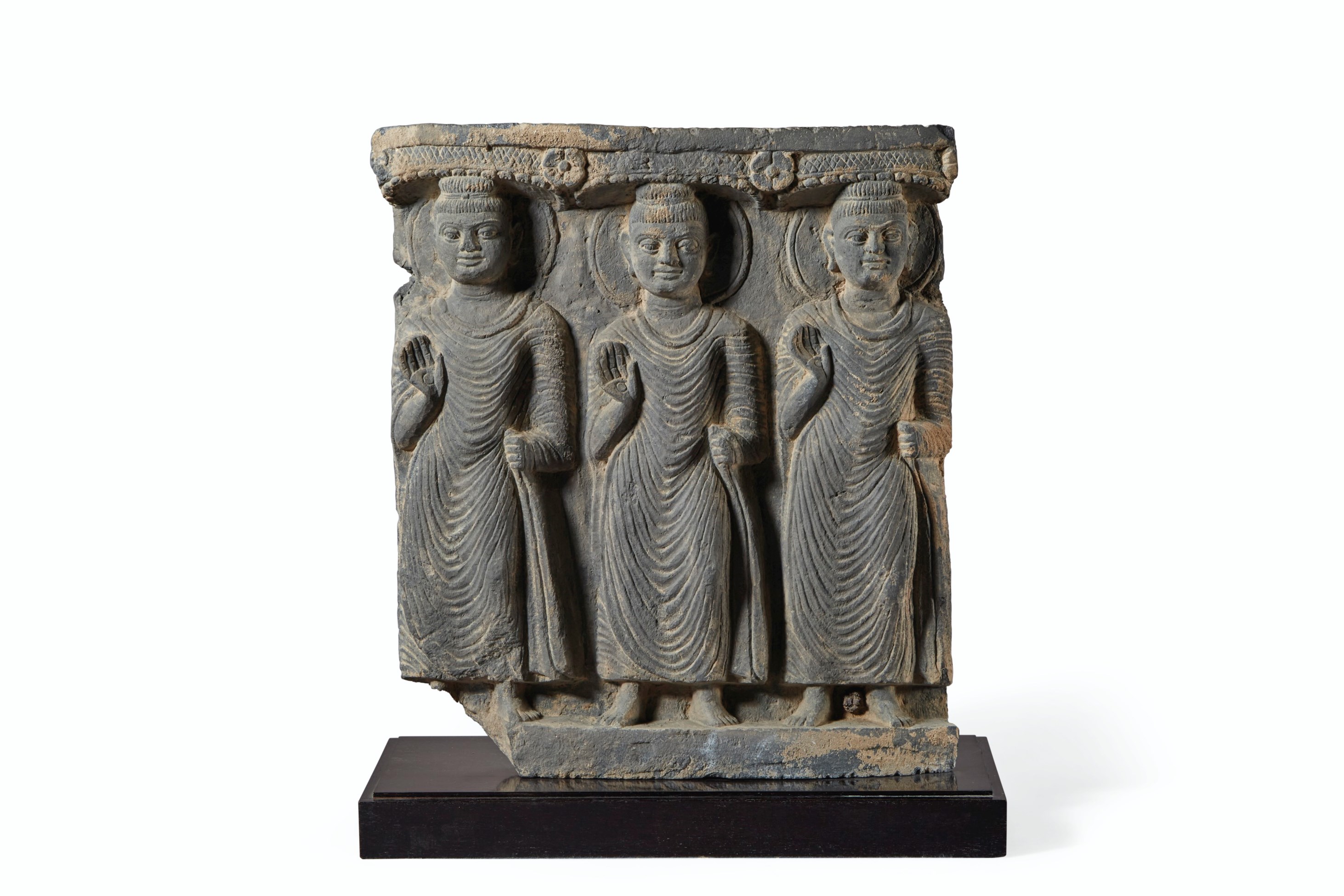 A GRAY SCHIST RELIEF DEPICTING THREE BUDDHAS, ANCIENT REGION OF ...