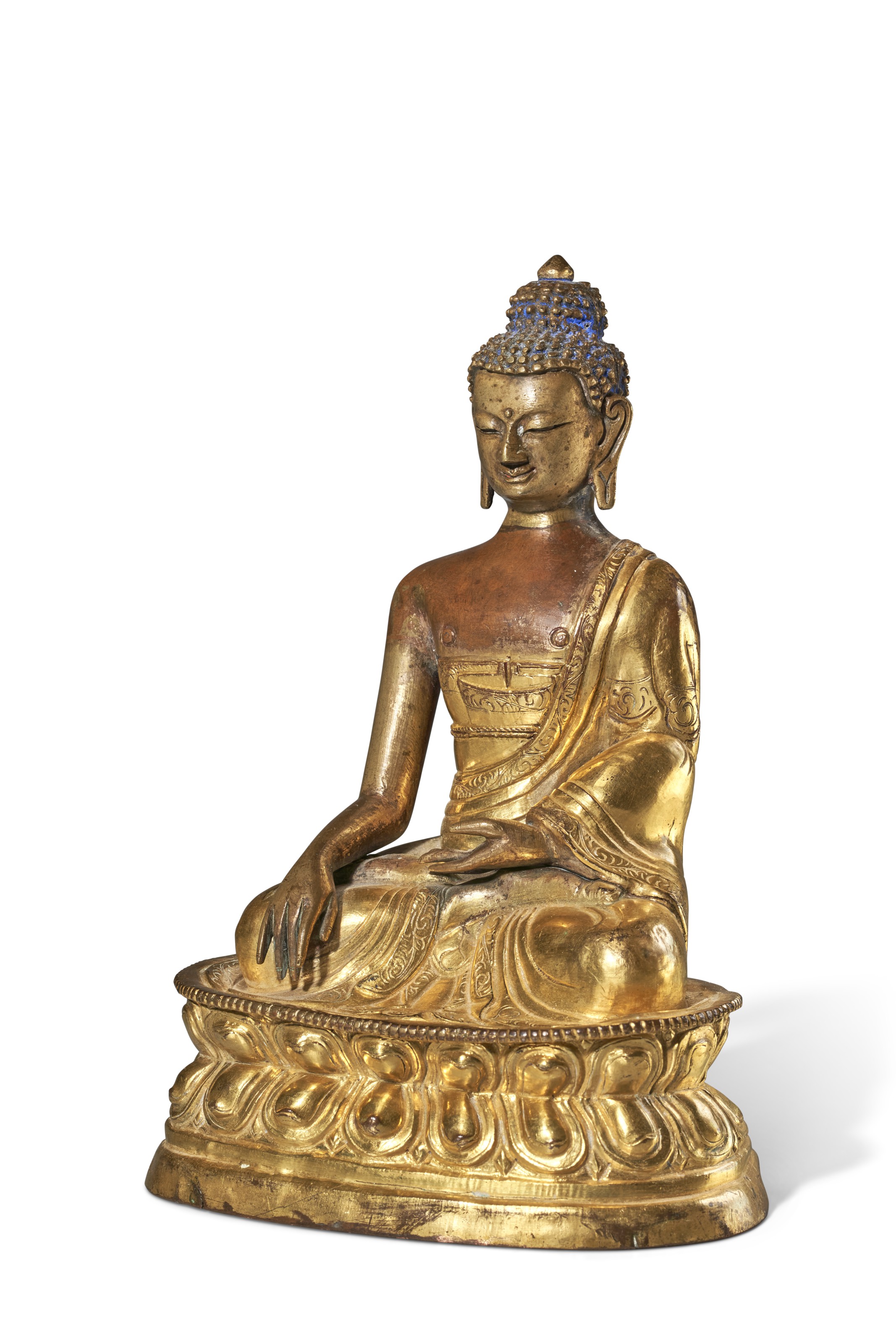 A GILT-BRONZE REPOUSSE FIGURE OF BUDDHA, INNER MONGOLIA, DOLONNOR
