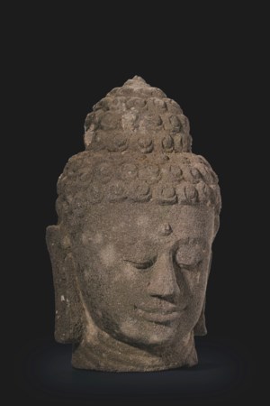 AN ANDESITE HEAD OF BUDDHA, INDONESIA, JAVA, 9TH-10TH CENTURY | Christie's