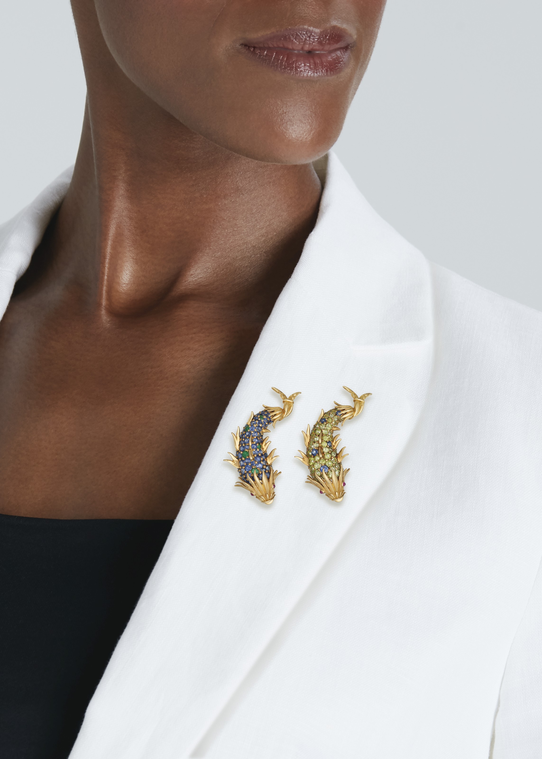 JEAN SCHLUMBERGER, TIFFANY & CO. TWO MULTI-GEM 'DOLPHIN' CLIP