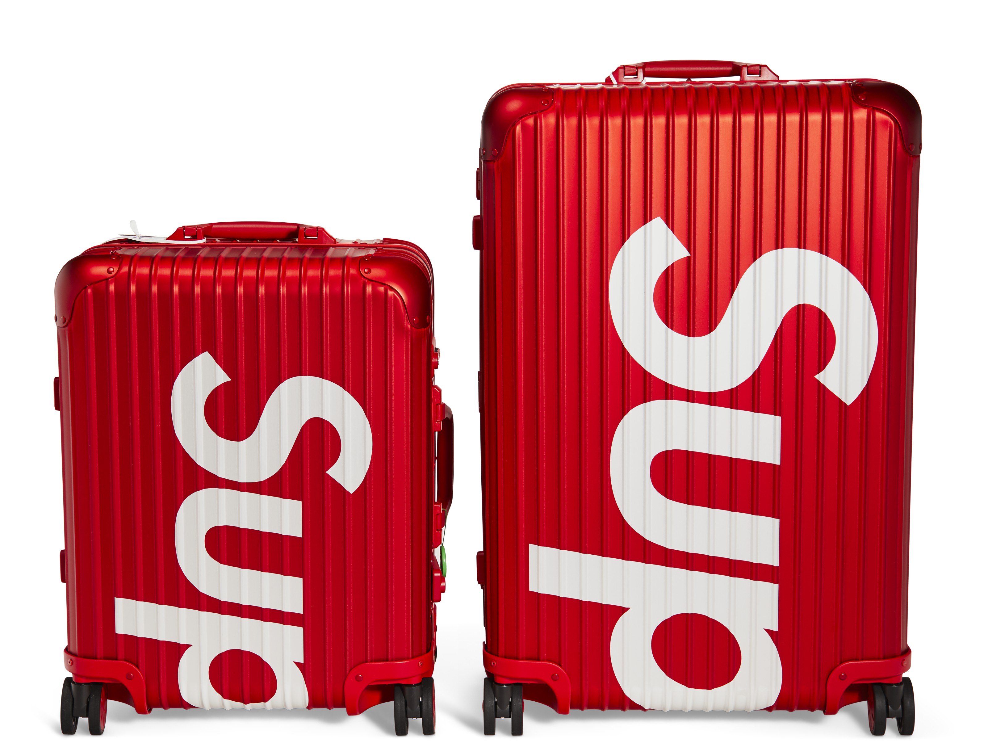 A PAIR OF LIMITED EDITION RED ALUMINUM SUITCASES RIMOWA X SUPREME
