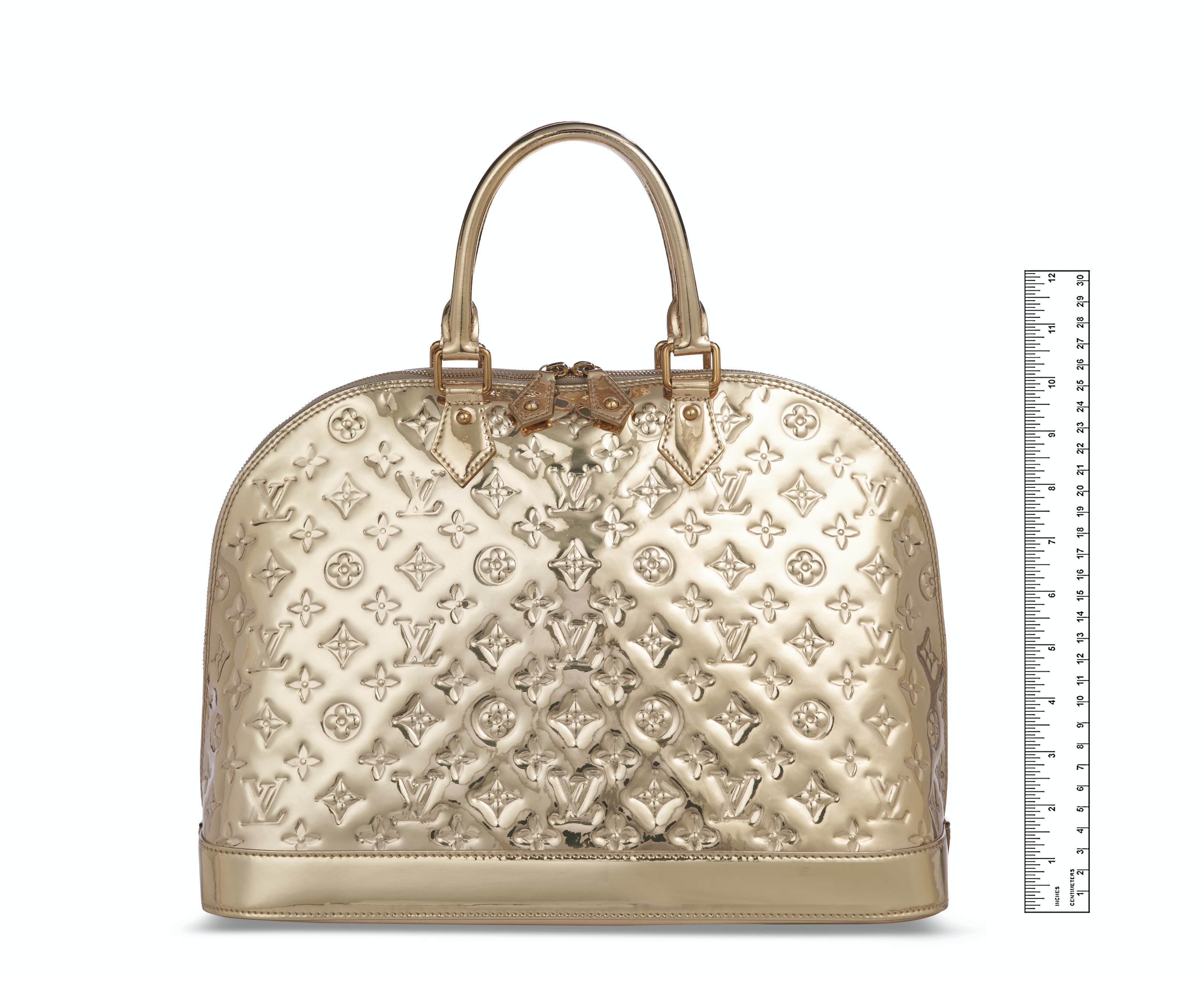 A LIMITED EDITION GOLD MONOGRAM MIROIR ALMA MM WITH GOLD HARDWARE