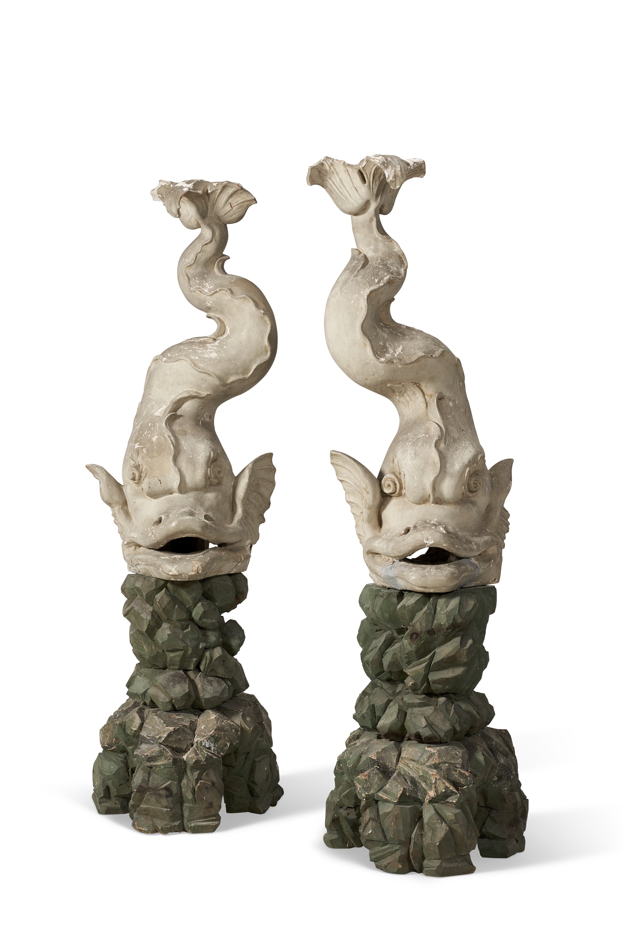 A PAIR OF NORTH ITALIAN PAINTED FIGURES OF DOLPHINS, PROBABLY