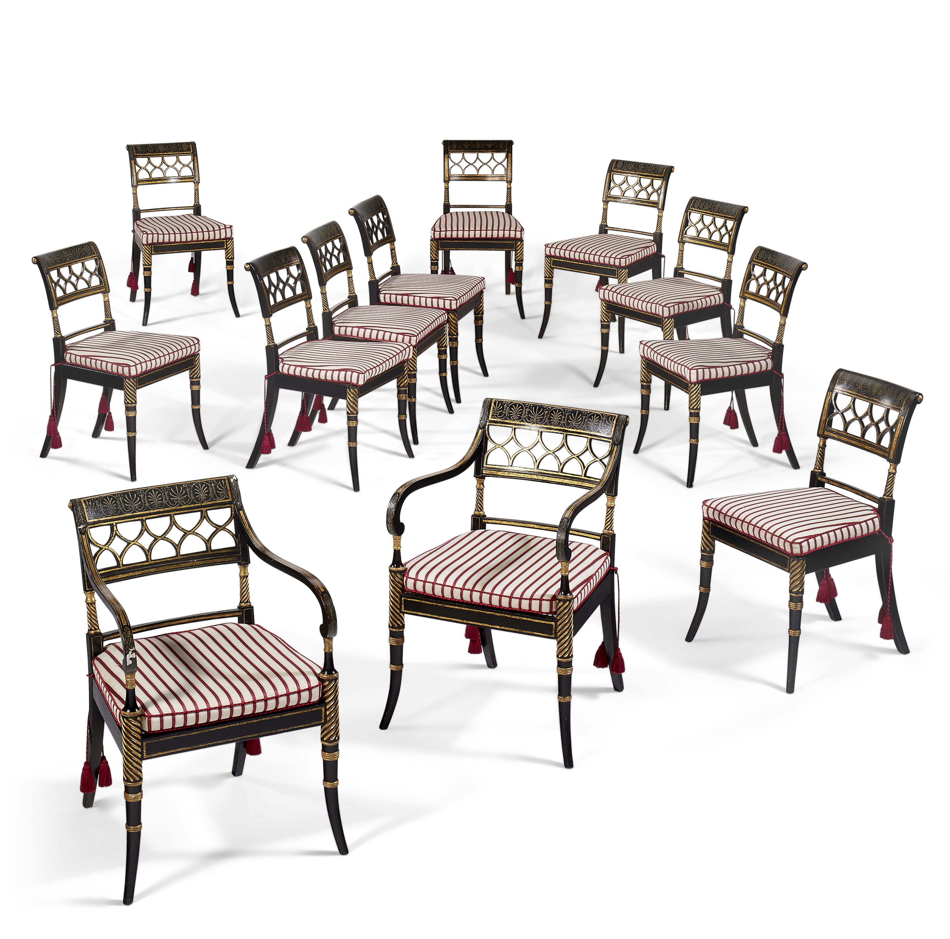 A set of twelve Regency ebonized and parcel-gilt dining chairs, eight c. 1815, four side chairs of a later date Sold for $18,750 on 19 October 2021, Online