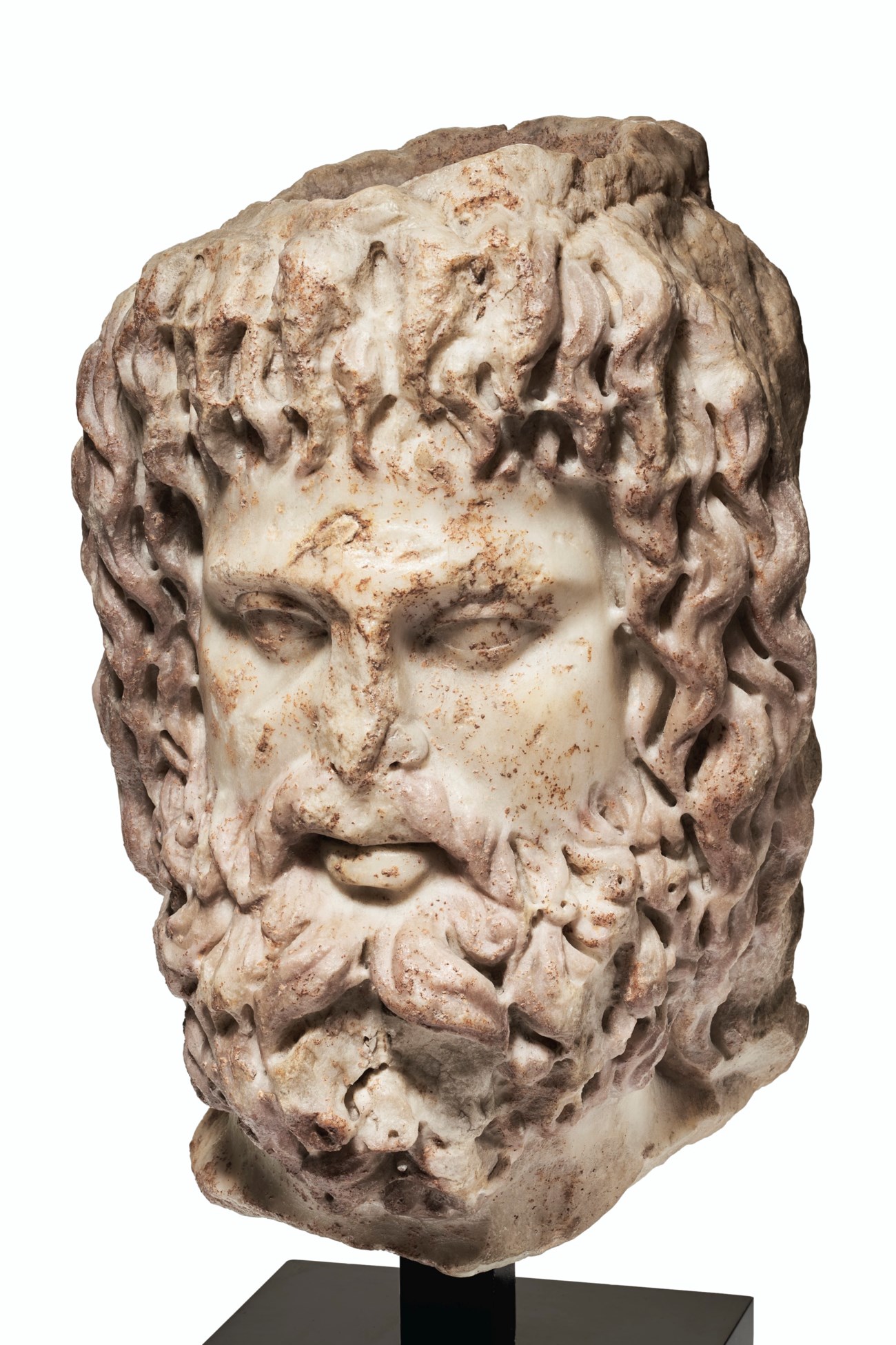 A ROMAN MARBLE HEAD OF SERAPIS, LATE ANTONINE PERIOD TO EARLY SEVERAN ...