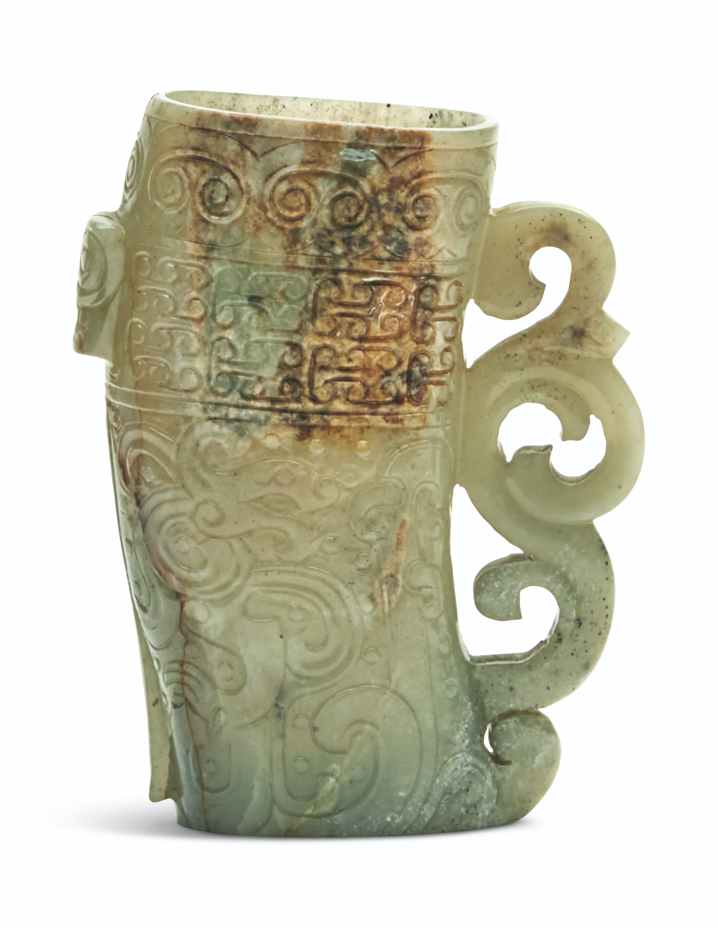 A CELADON AND RUSSET JADE RHYTON, CHINA, MING DYNASTY, 17TH CENTURY ...