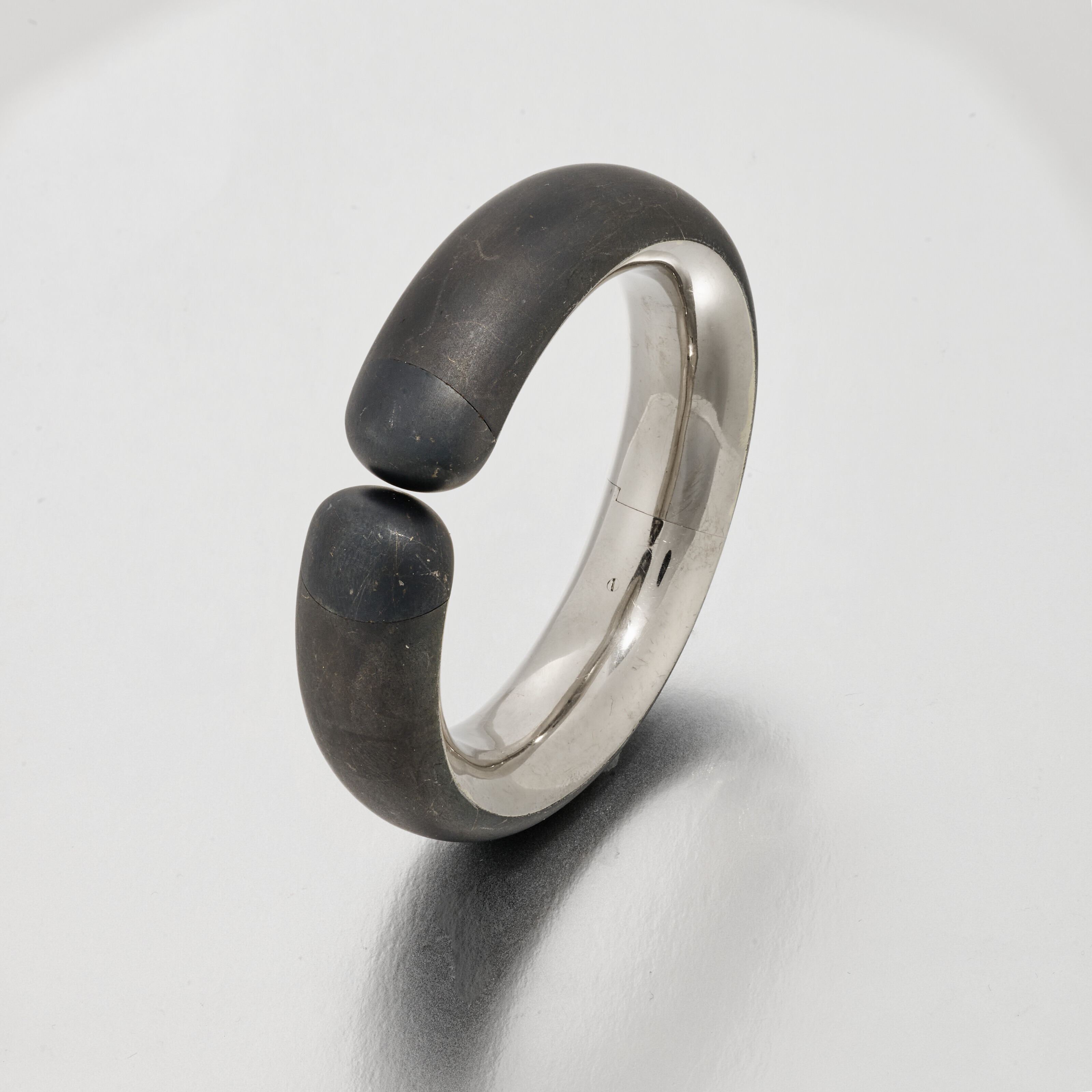 Iron bangle for protection clearance