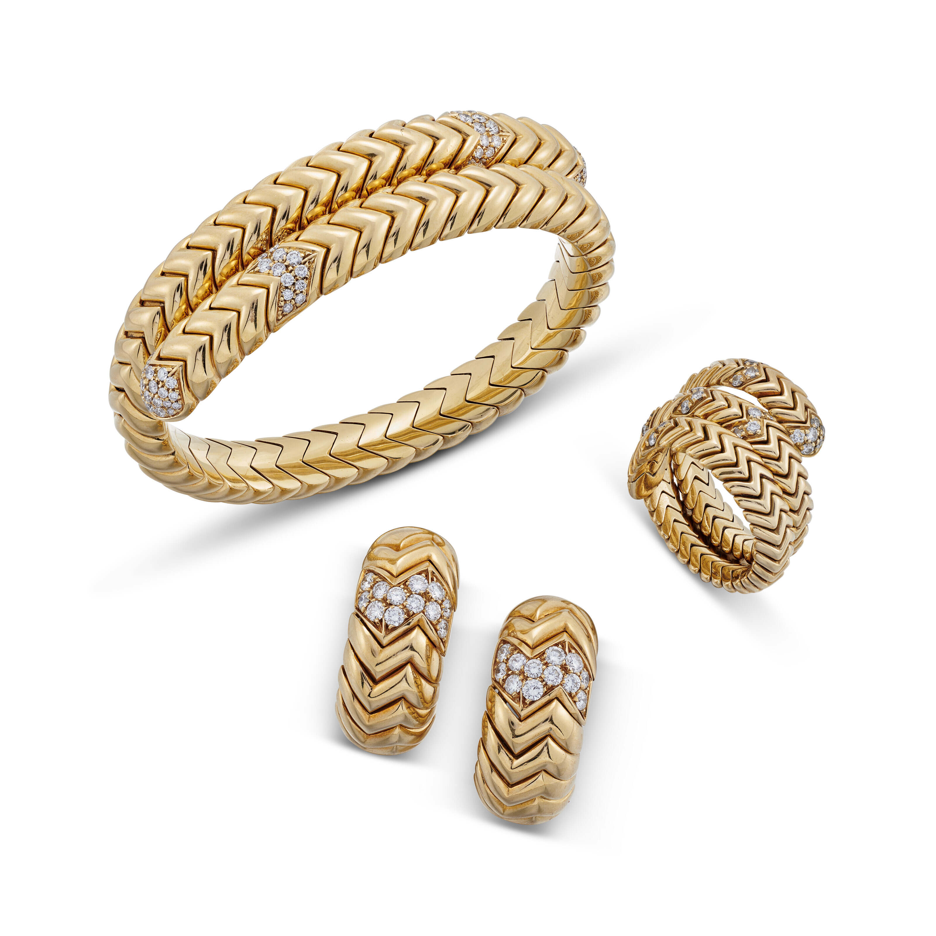 BULGARI DIAMOND 'SPIGA' BRACELET, RING AND EARRING SUITE, Christie's