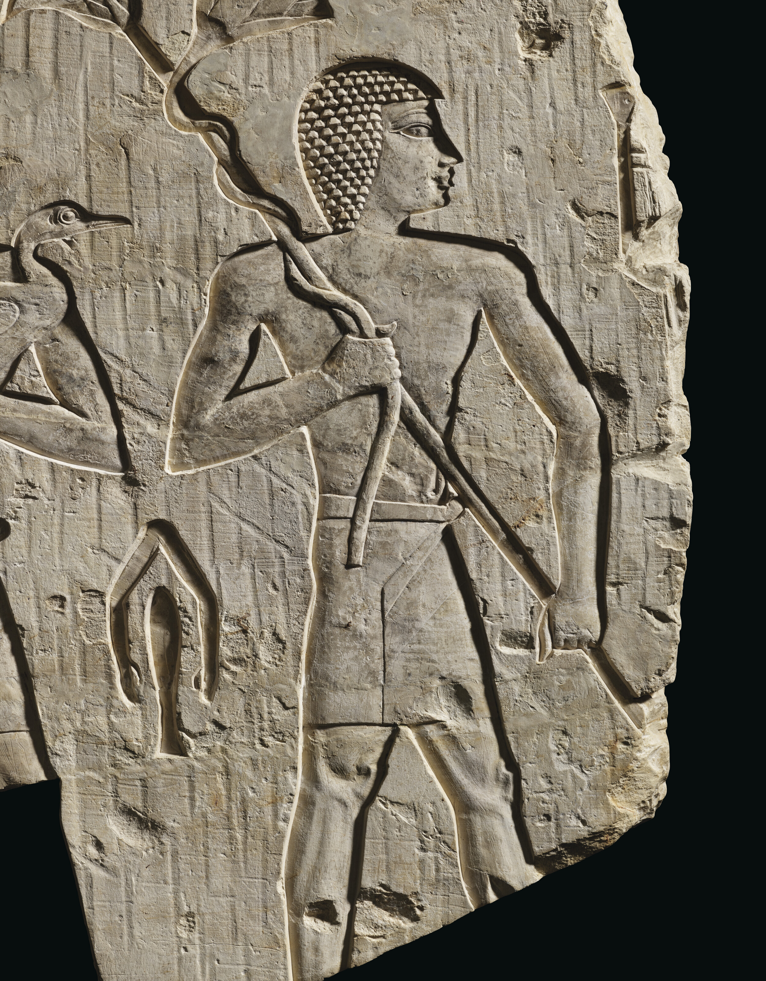 AN EGYPTIAN LIMESTONE RELIEF, THIRD INTERMEDIATE PERIOD- LATE