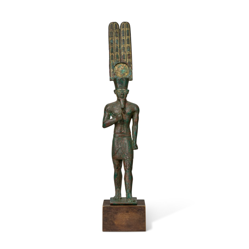 AN EGYPTIAN GOLDINLAID BRONZE AMUN, THIRD INTERMEDIATE PERIOD, CIRCA