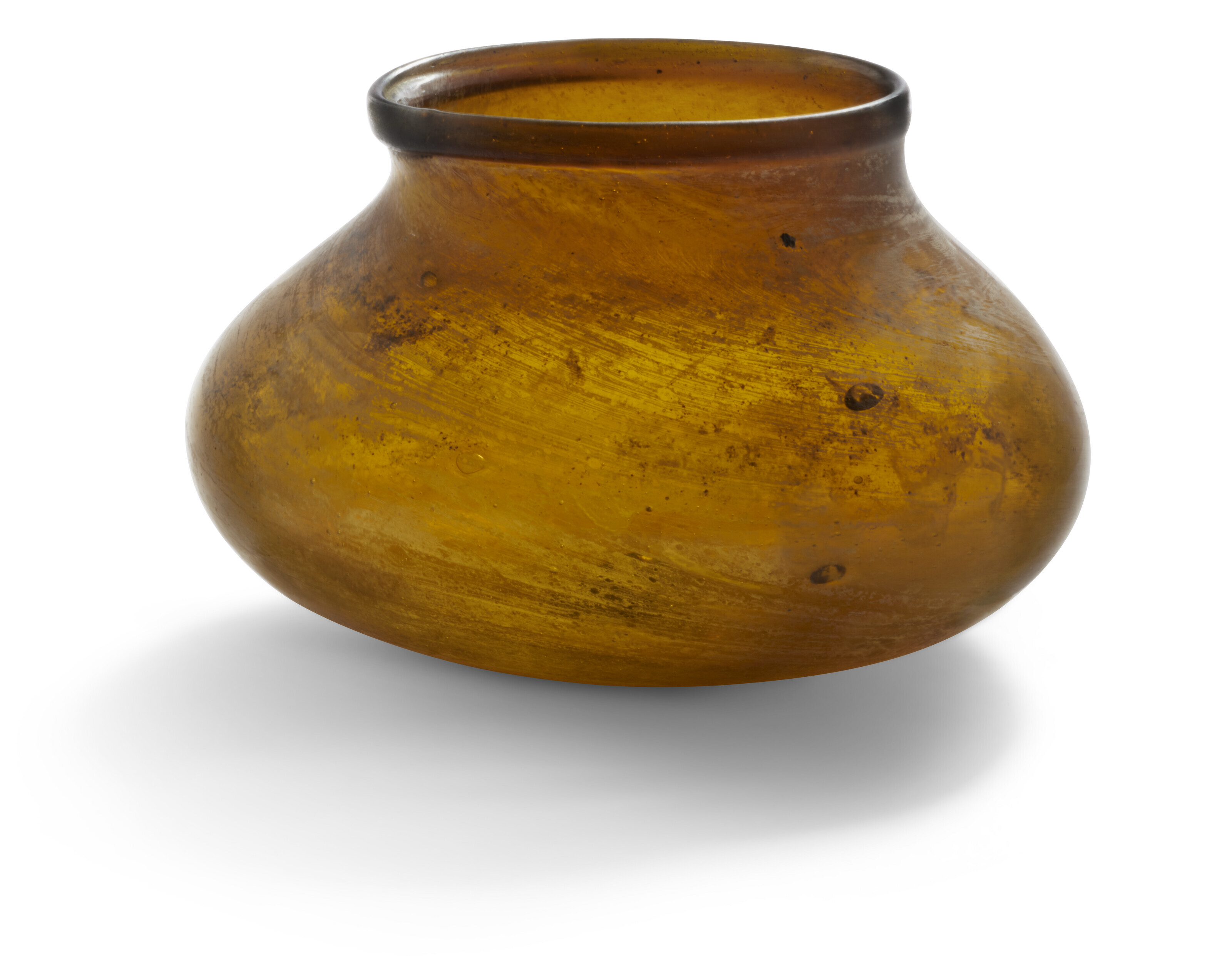 A Merovingian amber glass bag beaker, circa late 6th-7th century AD. 2 15&frasl;16 in (7.4 cm) high. Sold for £2,016 on 7 December 2022 at Christie’s in London