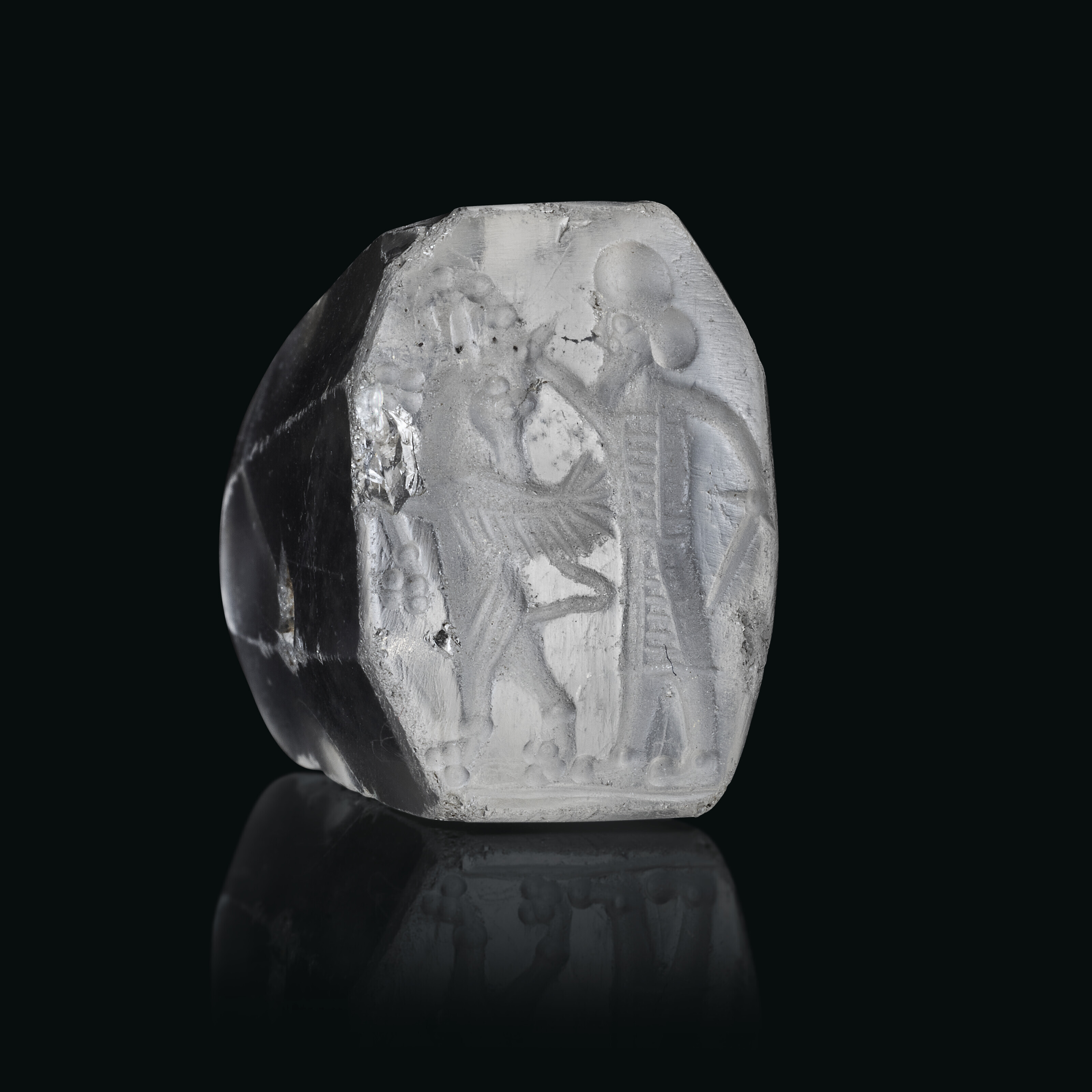 A Greco-Persian rock crystal pyramidal stamp seal with a hero and winged goat, Archaic Western Court style, late 6th century BC. 1116 in (1.8 cm) long. Sold for £2,016 on 7 December 2022 at Christie’s in London