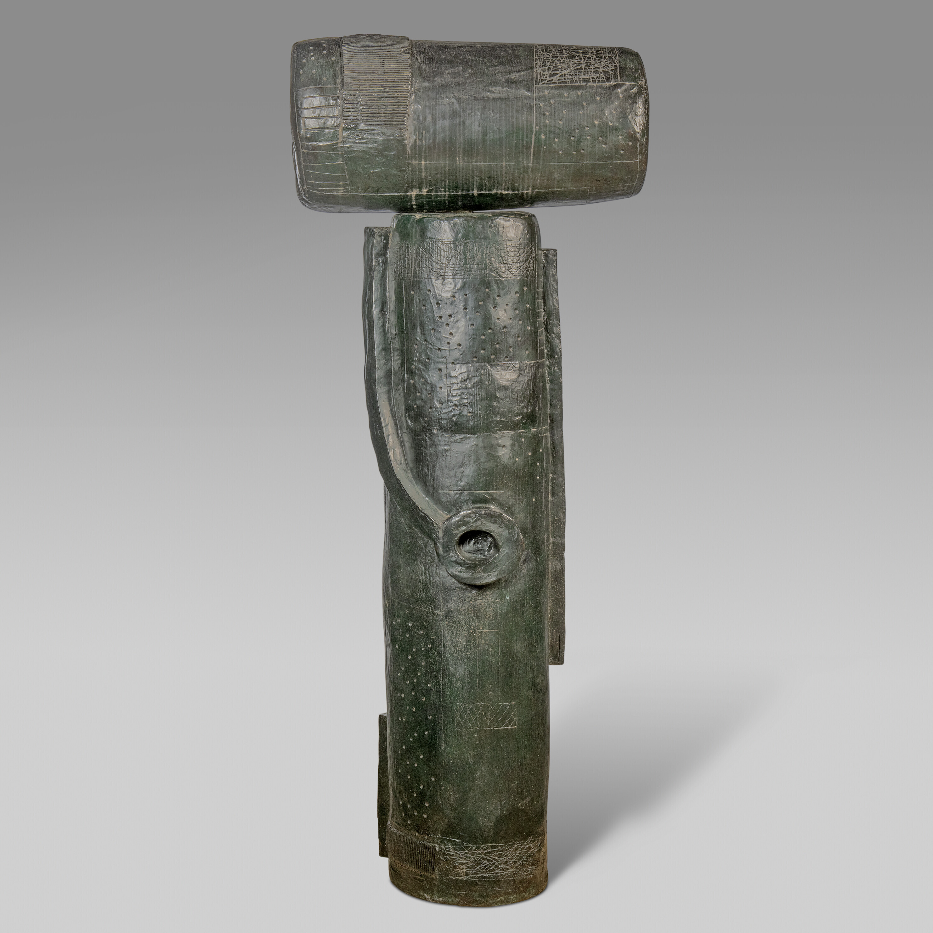 William Turnbull (1922-2012). Ancestral Totem, 1956-58. Bronze with a dark green patina. 73&frac14; in (187.4 cm) high. Estimate: &pound;200,000-300,000. Offered in The Collection of Sir Nicholas Goodison - British Art: Innovation and Craftsmanship on 25 May 2022 at Christie&rsquo;s in London