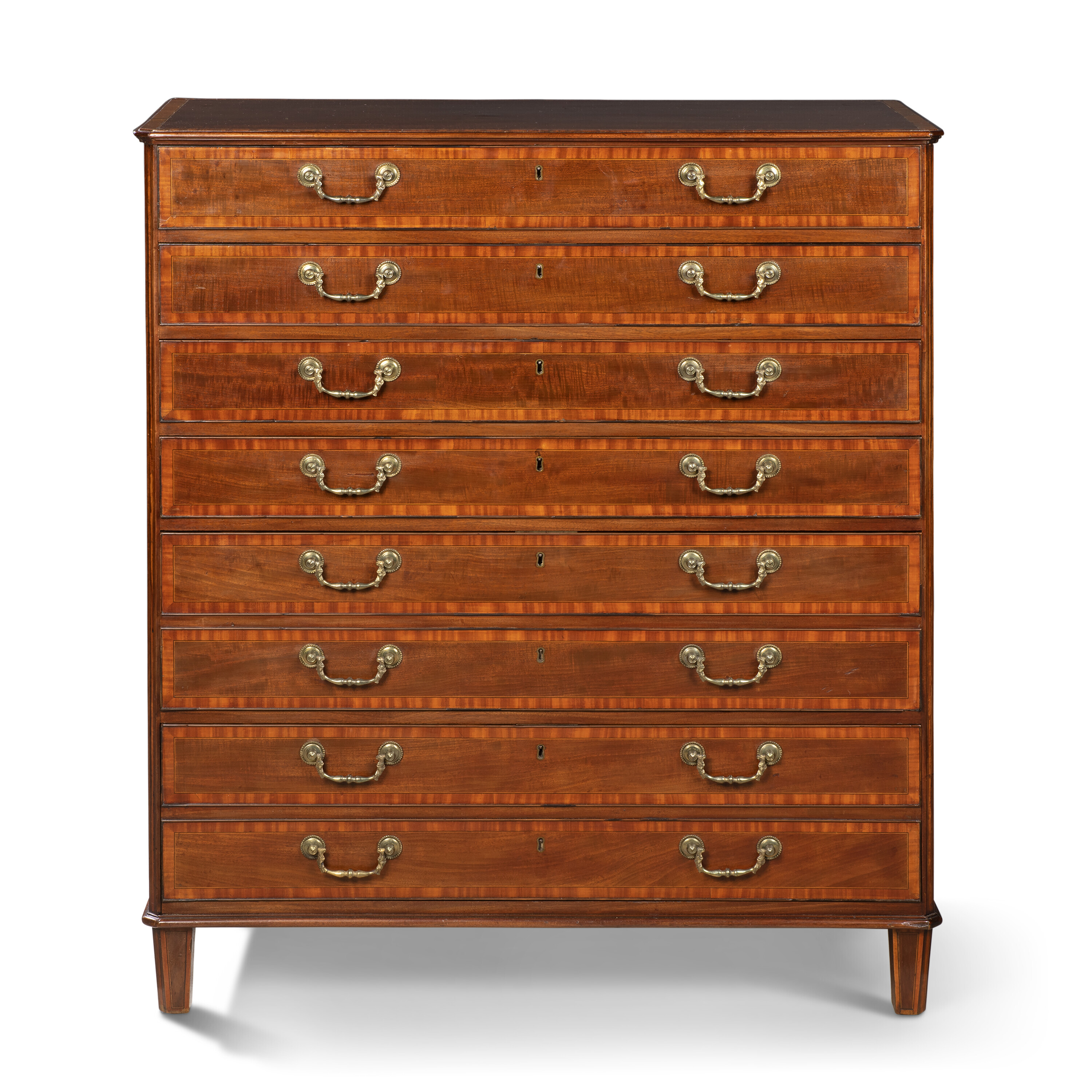 A George III satinwood-crossbanded mahogany chest. By William Ince and John Mayhew, 1792. 48&frac14; in (122.5 cm) high; 42 in (107 cm) wide; 20&frac14; in (51.5 cm) deep. Sold for &pound;44,100 on 22 November 2022 at Christie&rsquo;s in London from the Collection of Lord and Lady Weinstock