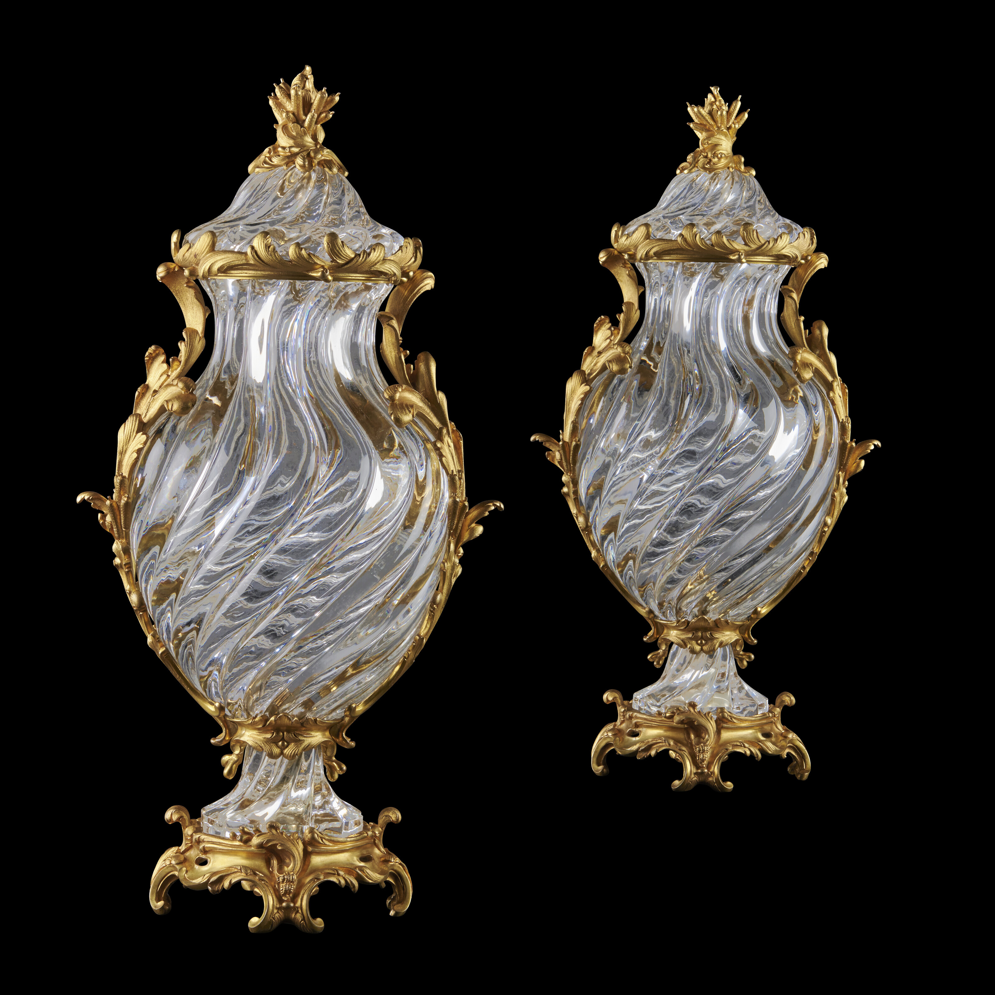 A LARGE PAIR OF FRENCH ORMOLUMOUNTED MOULDED CRYSTAL VASES AND COVERS