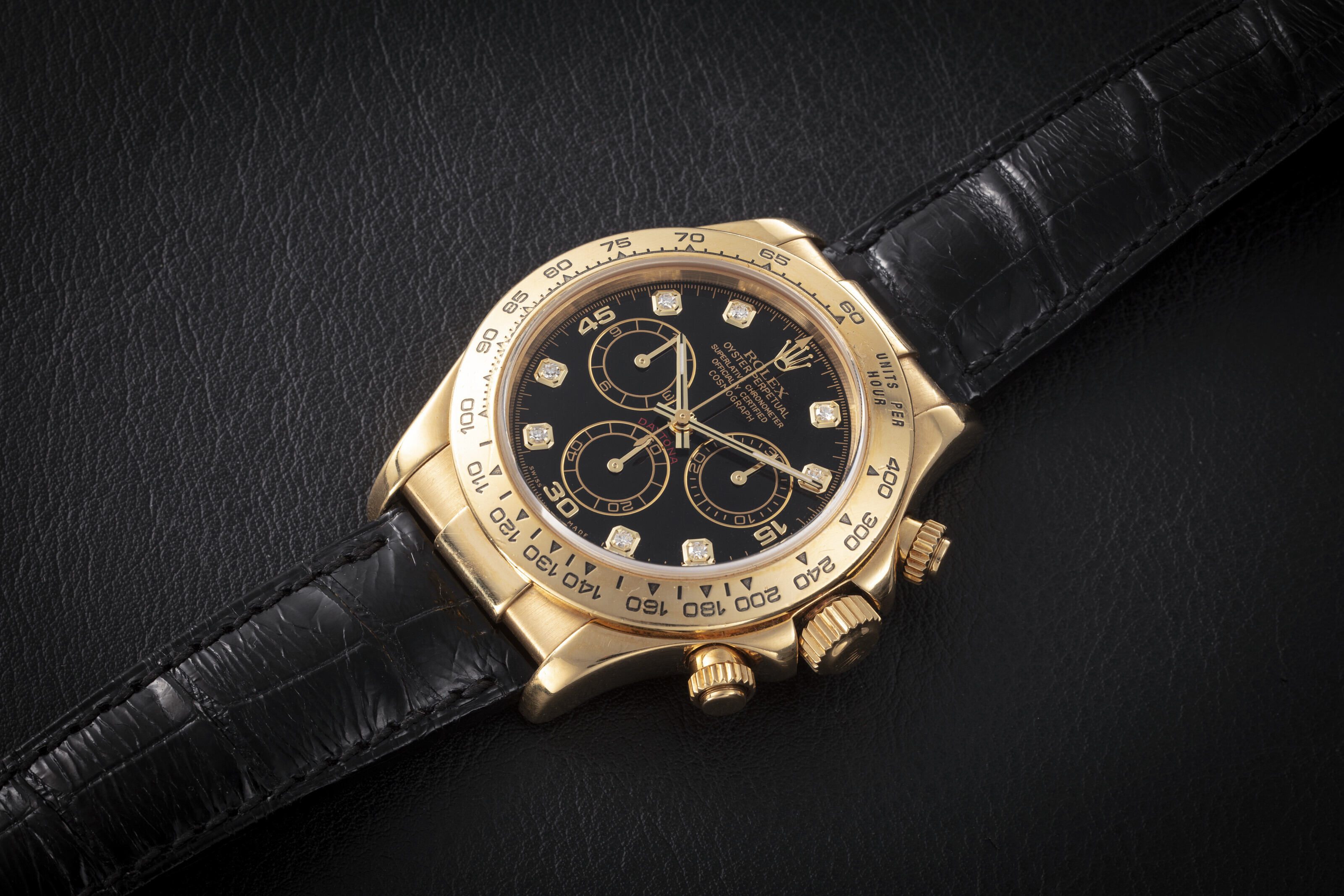 ROLEX, DAYTONA REF. 116518, A GOLD AUTOMATIC CHRONOGRAPH
