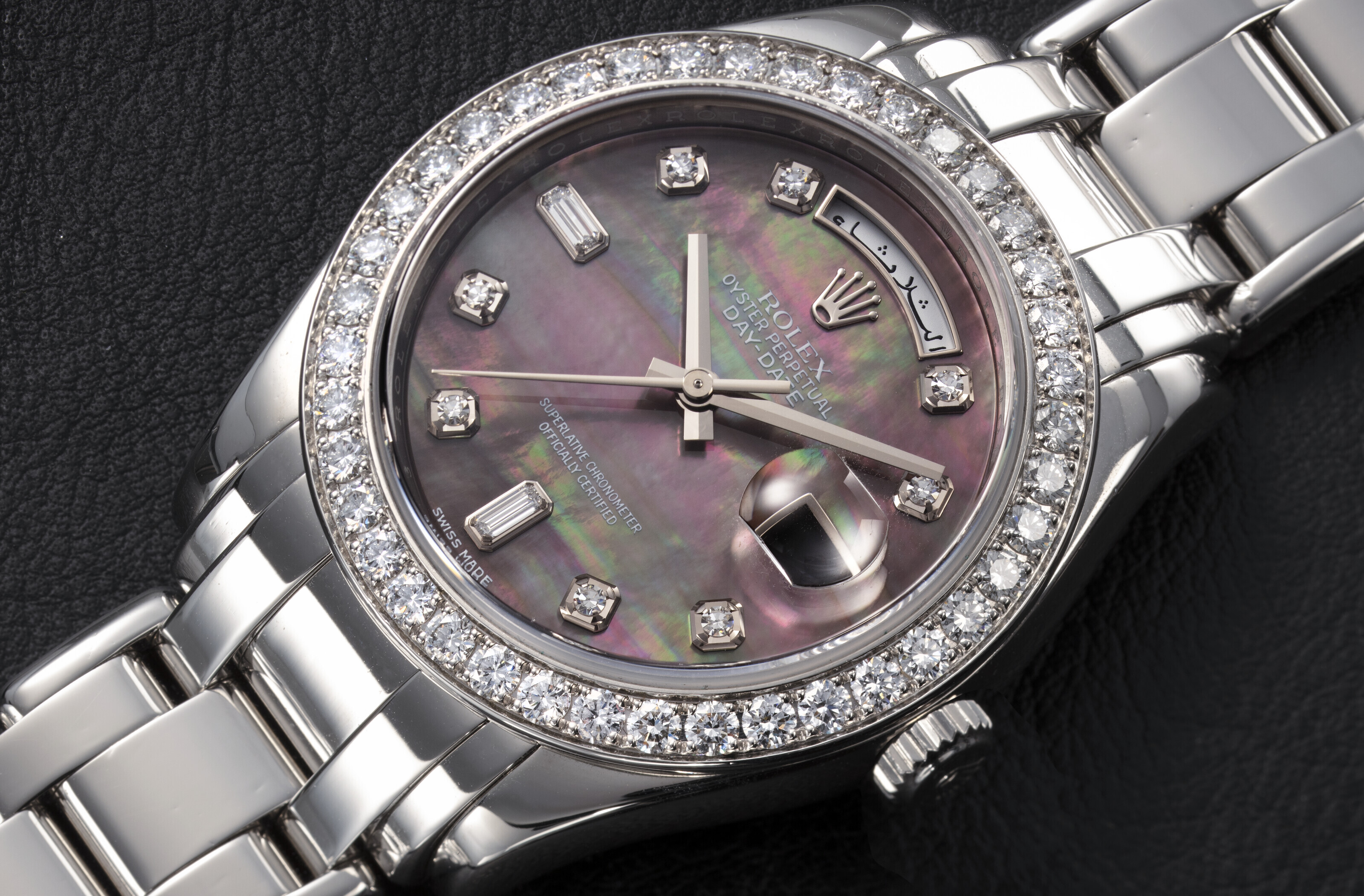 ROLEX, DAY-DATE REF. 18946, A PLATINUM AND DIAMOND-SET WRISTWATCH