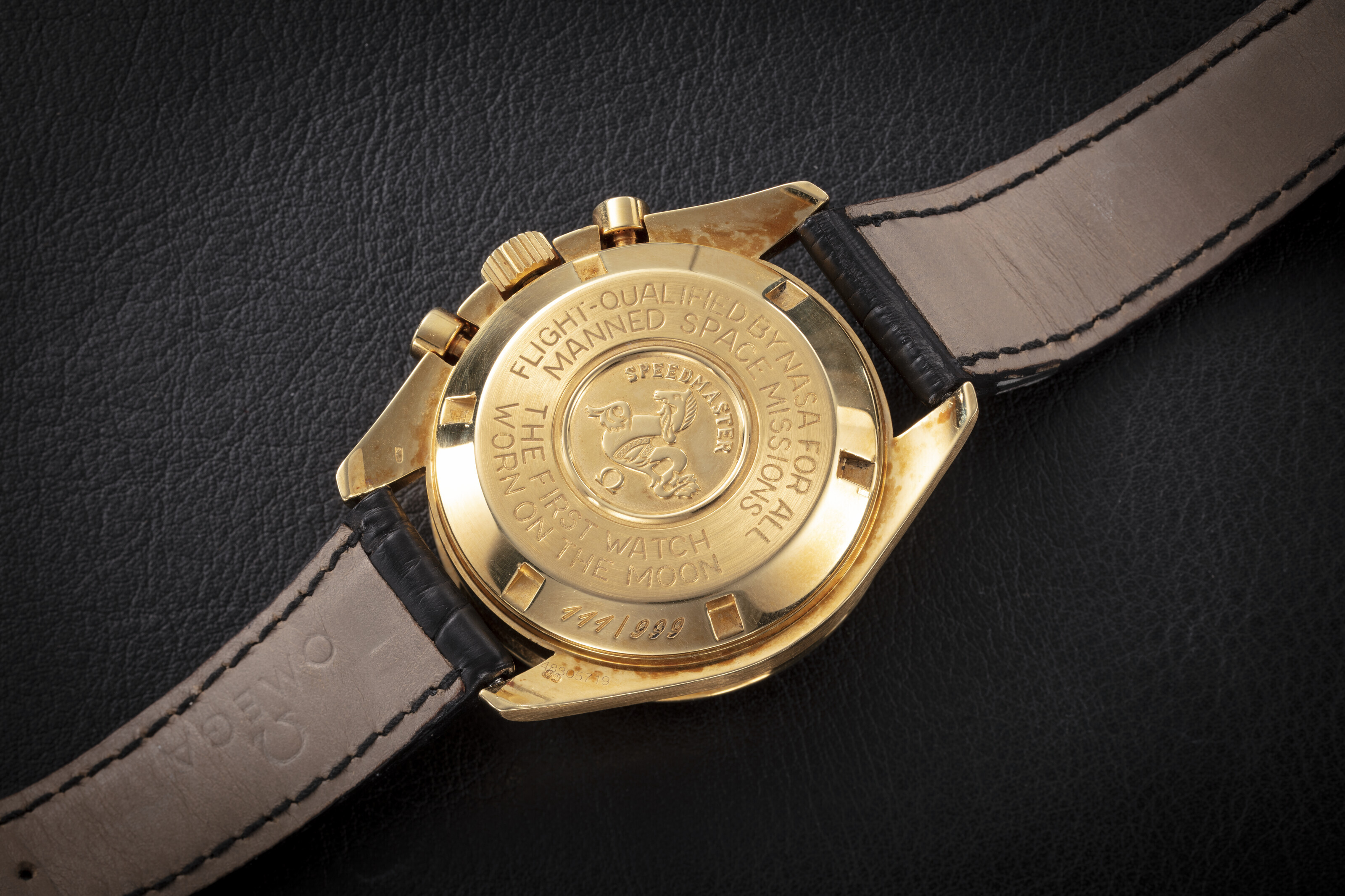 OMEGA SPEEDMASTER JUBILEE 27 CHRO C12 A LIMITED EDITION GOLD CHRONOGRAPH TO MARK THE 50TH ANNIVERSARY OF MOON CALIBRE CASE NUMBER 111 999 MOVEMENT NUMBER 48 305 719 Christie s