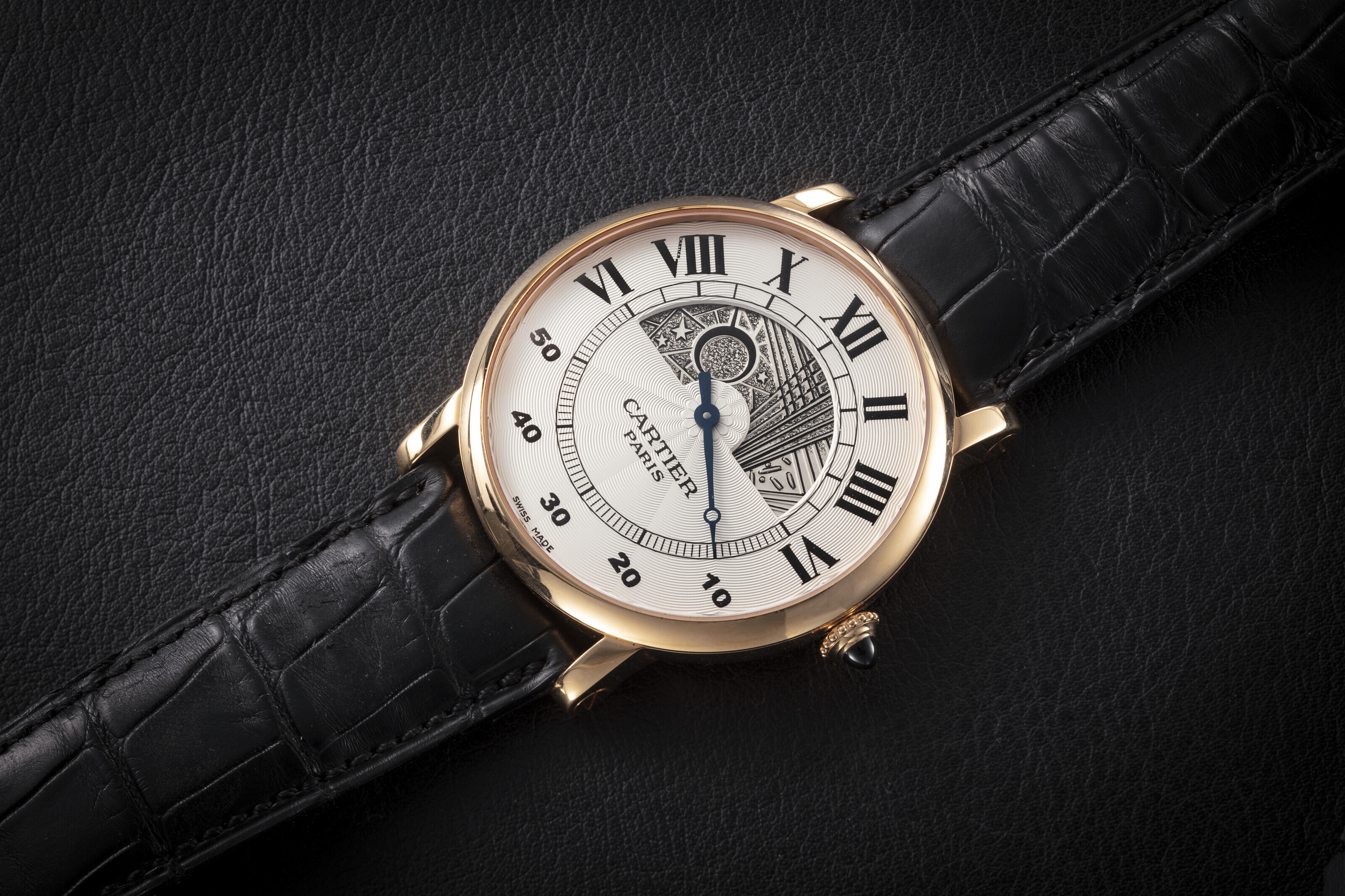 CARTIER ROTONDE JOUR ET NUIT A GOLD WRISTWATCH WITH HAND ENGRAVED DAY AND NIGHT DISPLAY AND RETROGRADE MINUTES HAND CASE NUMBER 139 Christie s