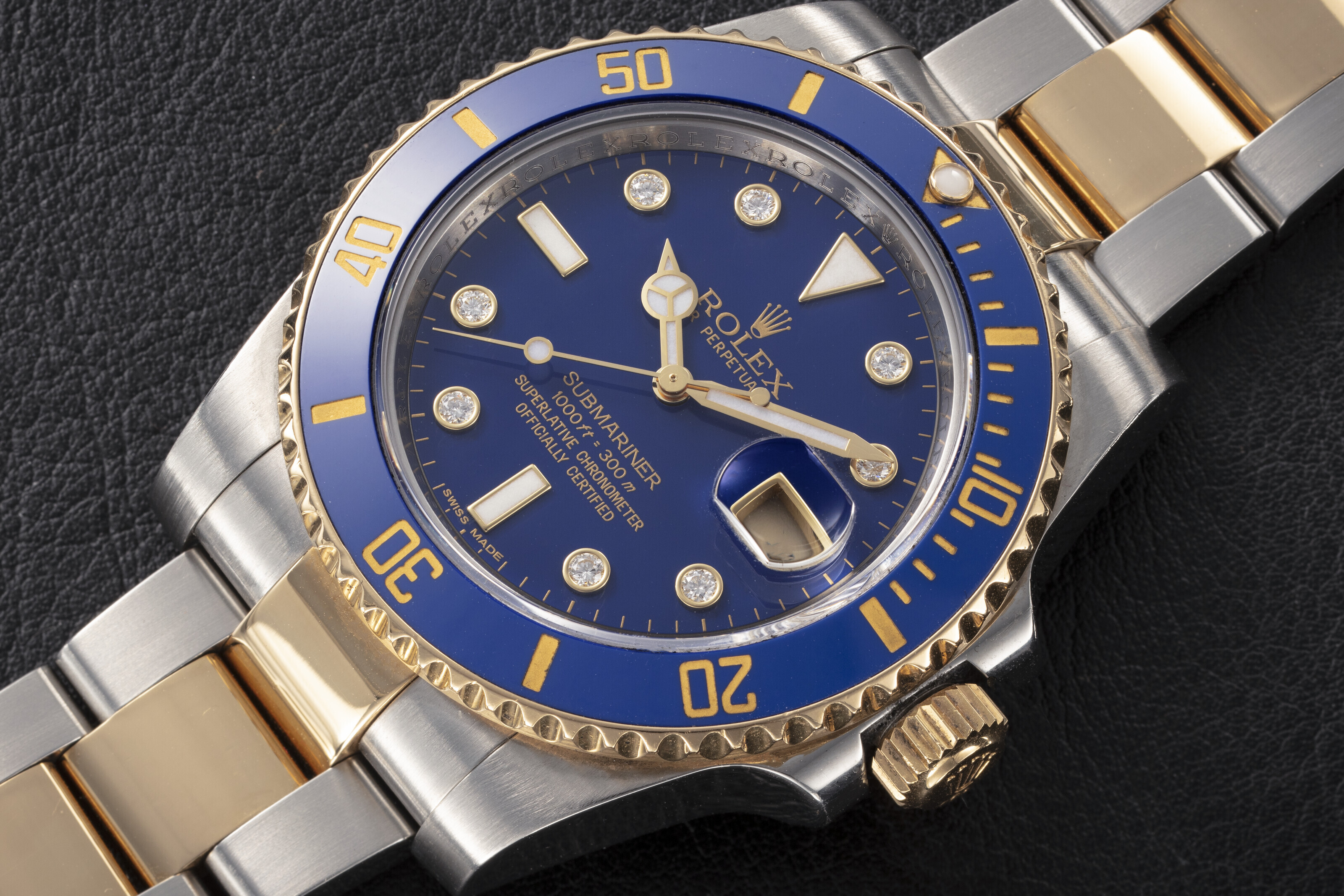 ROLEX SUBMARINER REF. 11613LB A STEEL AND GOLD AUTOMATIC