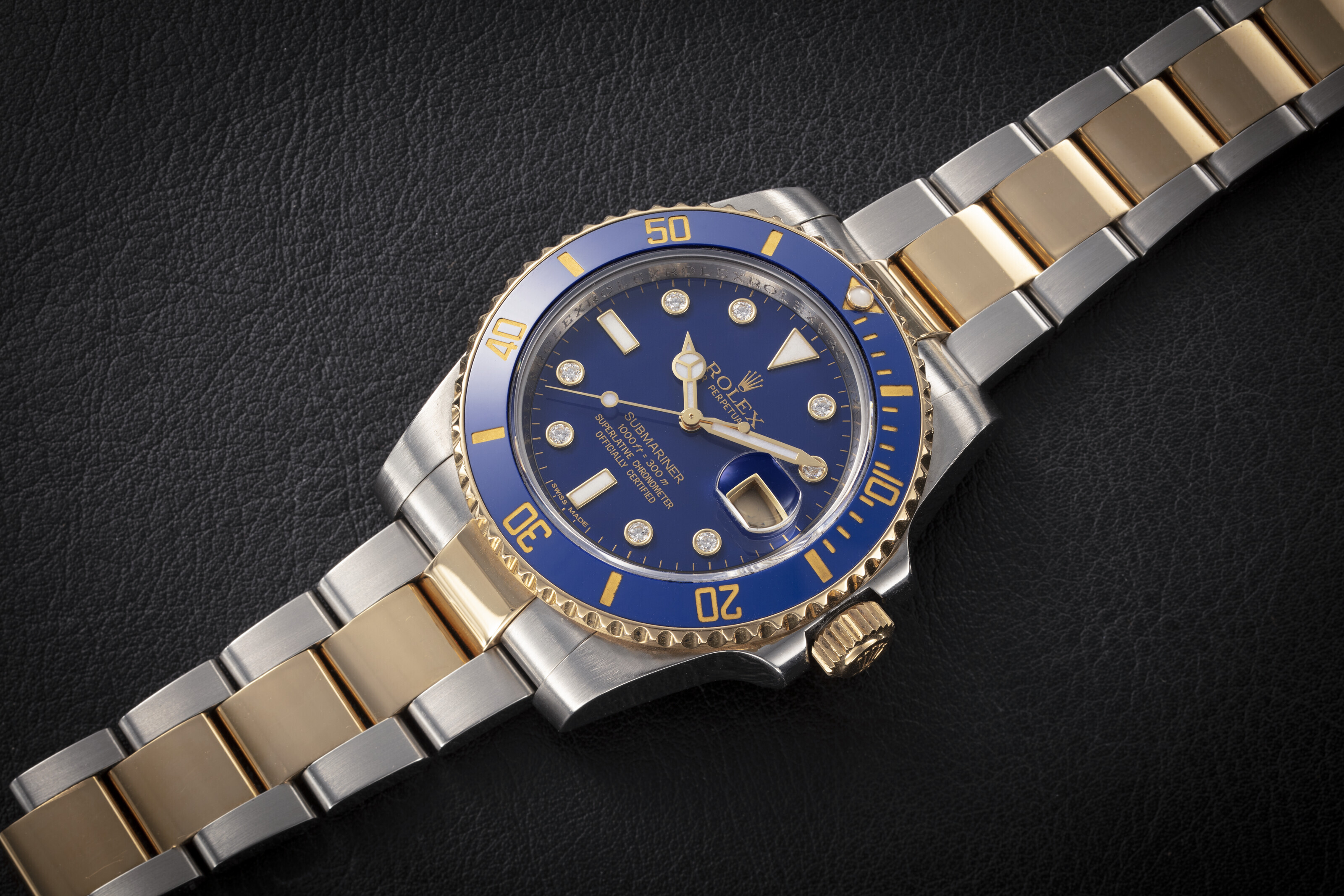 ROLEX SUBMARINER REF. 11613LB A STEEL AND GOLD AUTOMATIC