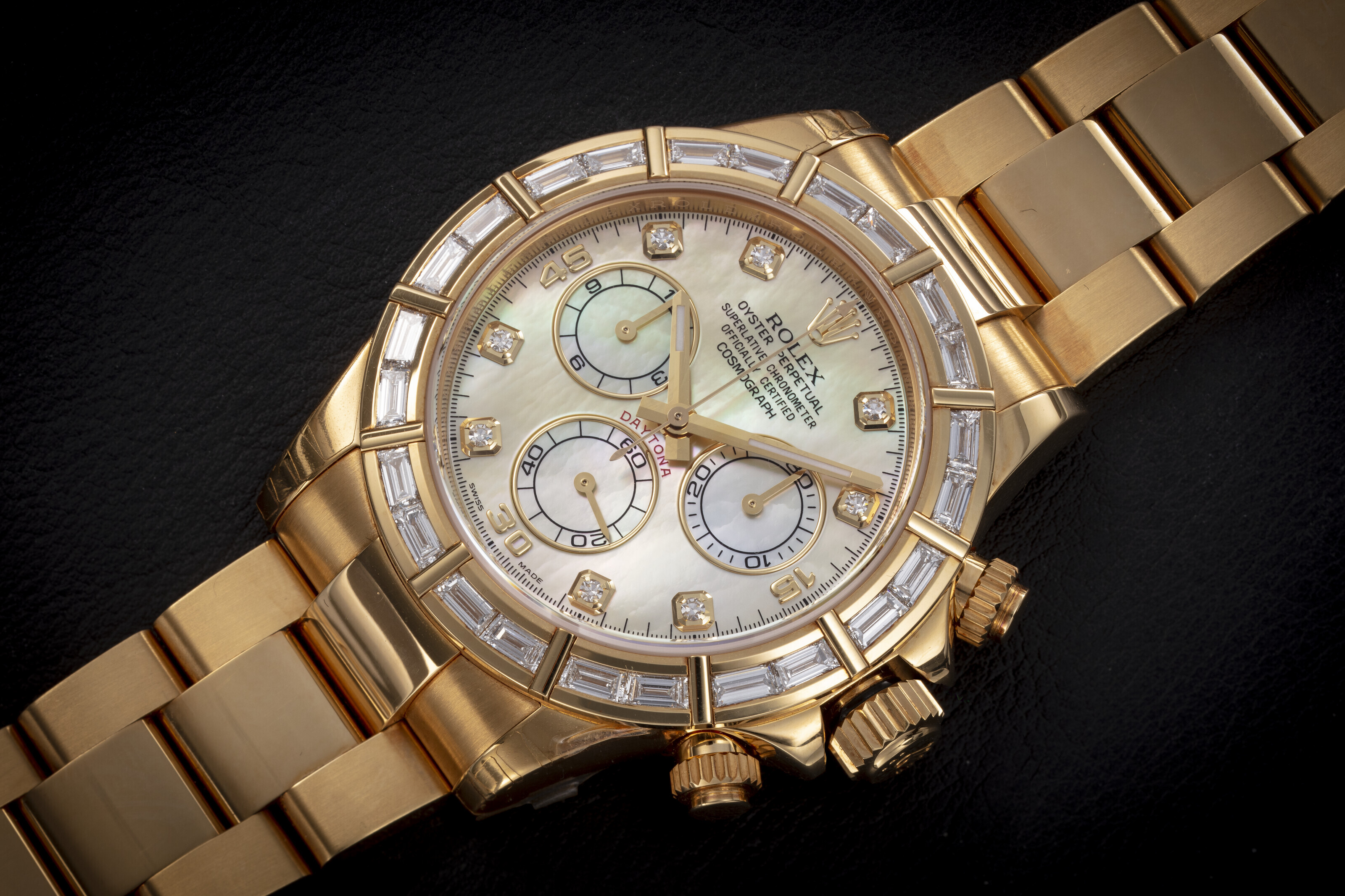 ROLEX DAYTONA REF. 116568BR GOLD AND DIAMOND SET WRISTWATCH WITH MOTHER OF PEARL DIAL NEW OLD STOCK